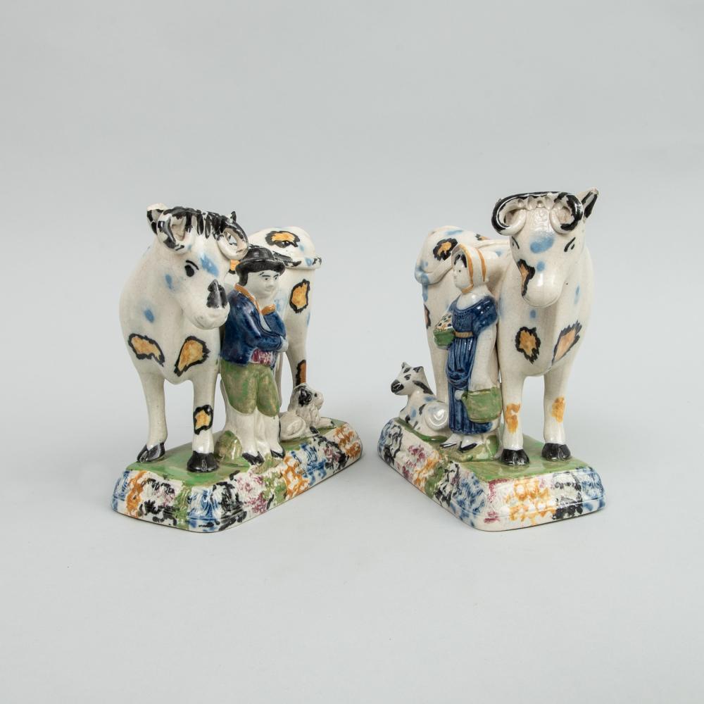 Prattware pottery models of cows with figures, 
Yorkshire,
1810-1820.
(Ref: ny9109-cram)

The Prattware pearlware unusually coloured cows are decorated with typical Prattware underglaze colours but here, unusually, also with blue and yellow