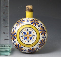 Prattware Pottery Spirit Flask Decorated with Dark Ochre and Blue Flowers, 1815