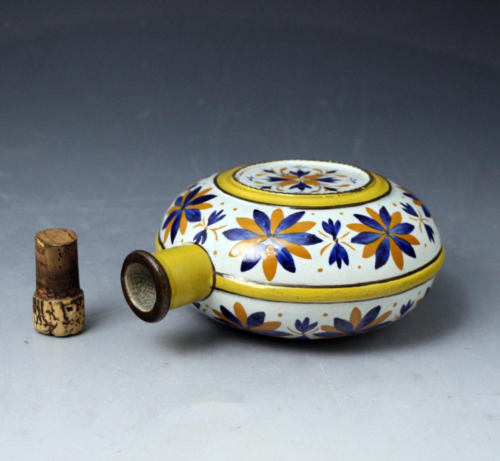 English Prattware Pottery Spirit Flask Decorated with Dark Ochre and Blue Flowers, 1815 For Sale