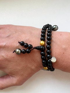Prayer bracelet/necklace with ebony beads, Golden South Sea and Tahiti pearls