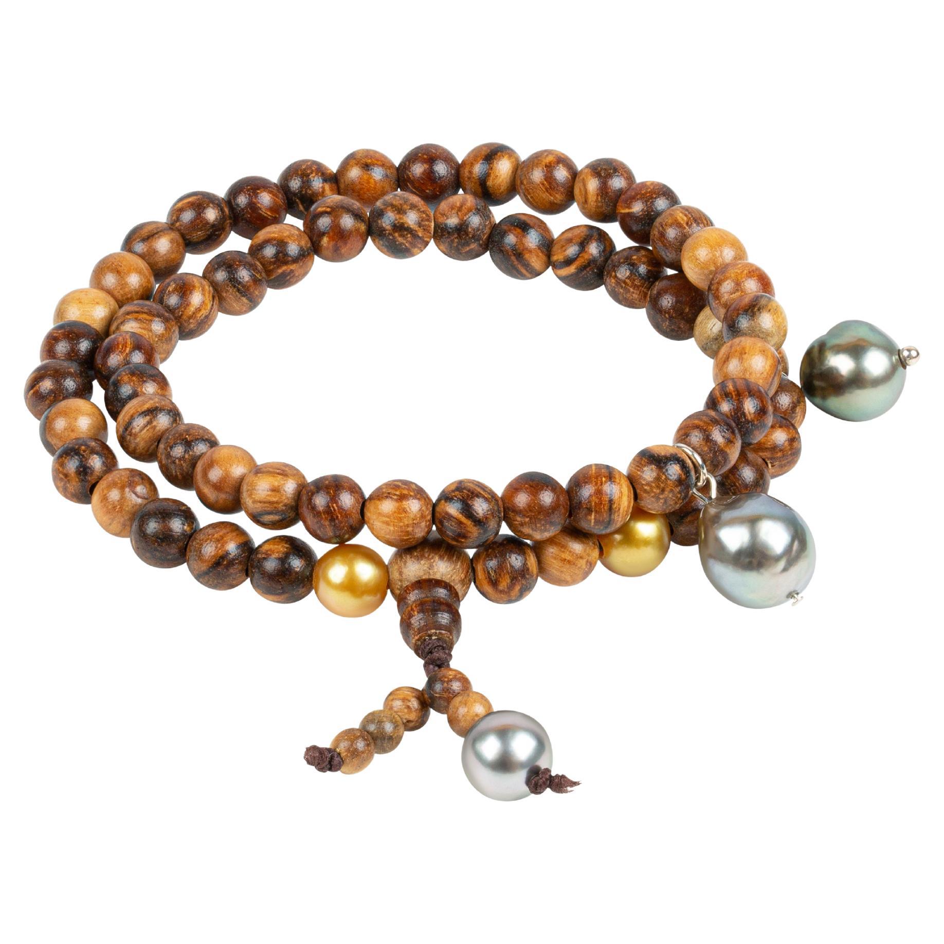 Prayer bracelet with sandalwood beads, Golden South Sea and Tahiti pearls