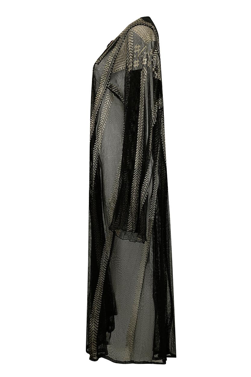 This spectacular late 1910s - 1920 Egyptian hammered silver Assiut kaftan is a rare and extremely collectable piece.  The line of the kaftan is soft and fluid with long wide set sleeves and full volumes of fabric that flare out from the bust with an