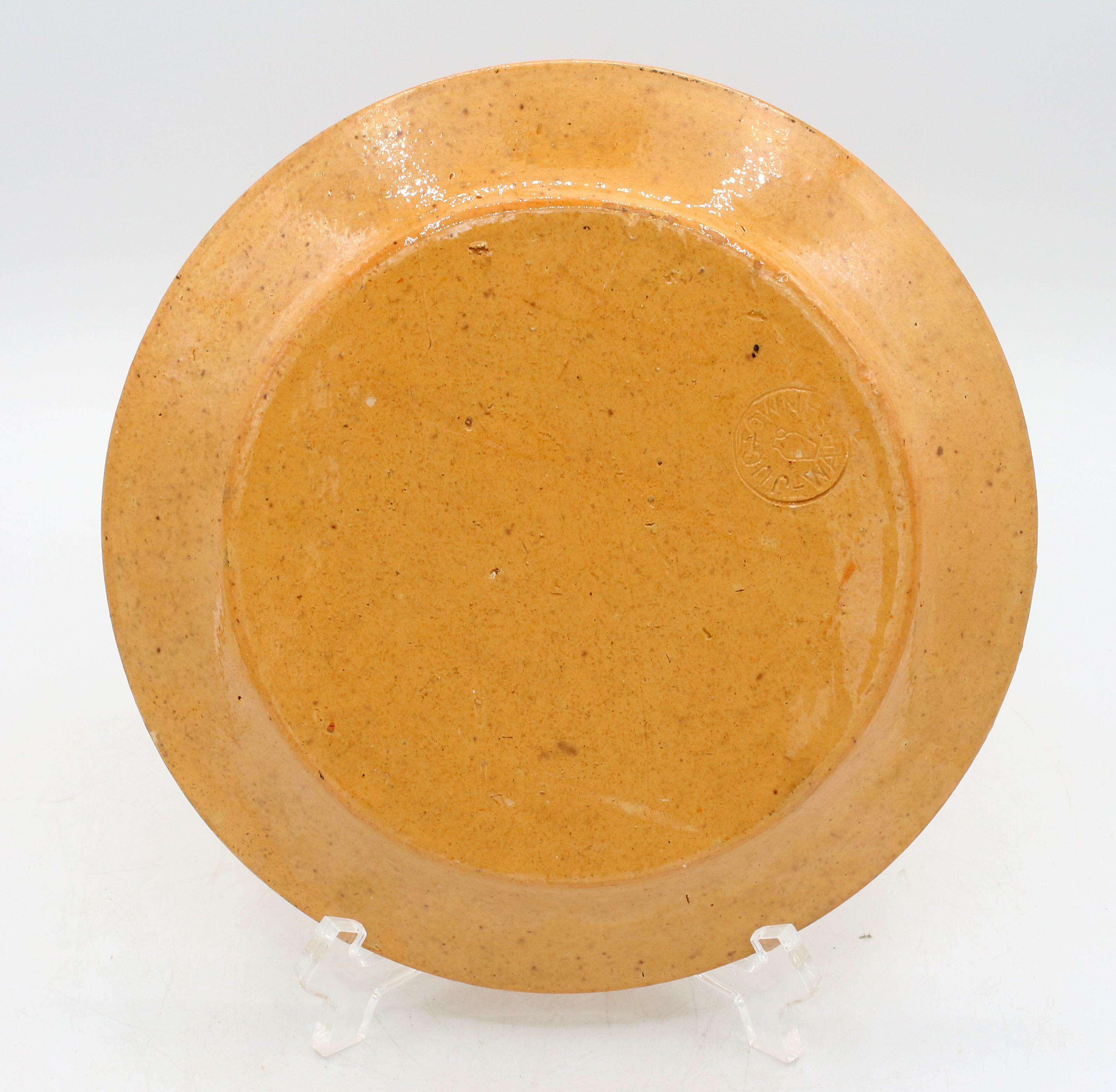 Pre-1960 Ben Owen I era Jugtown Ware yellow glazed plate. Fine condition. This is the earliest Jugtown mark without dates or initials.
8.25