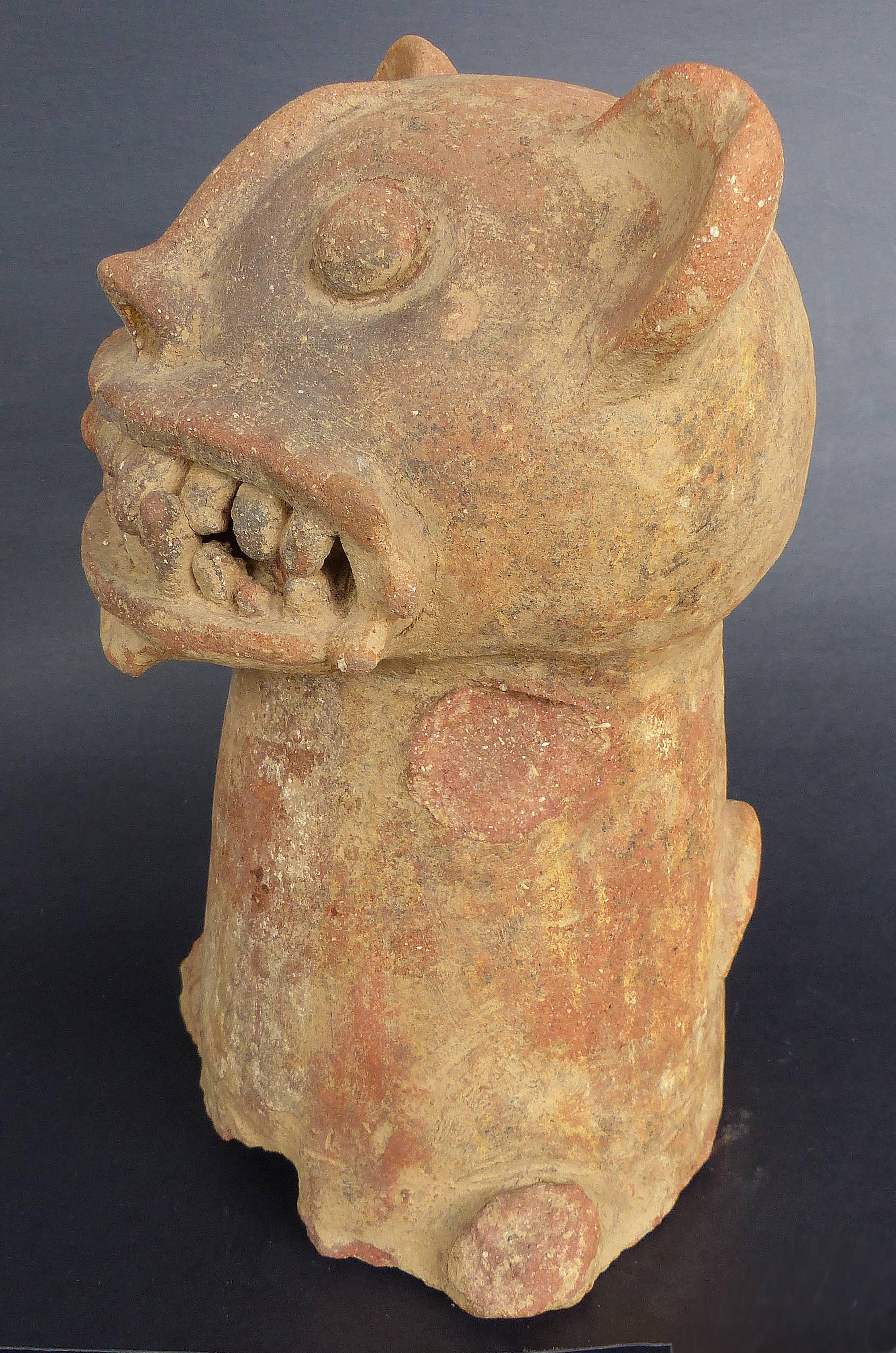 This intriguing terracotta figure of a grotesque animal is believed to be a Pre-Columbian terracotta 