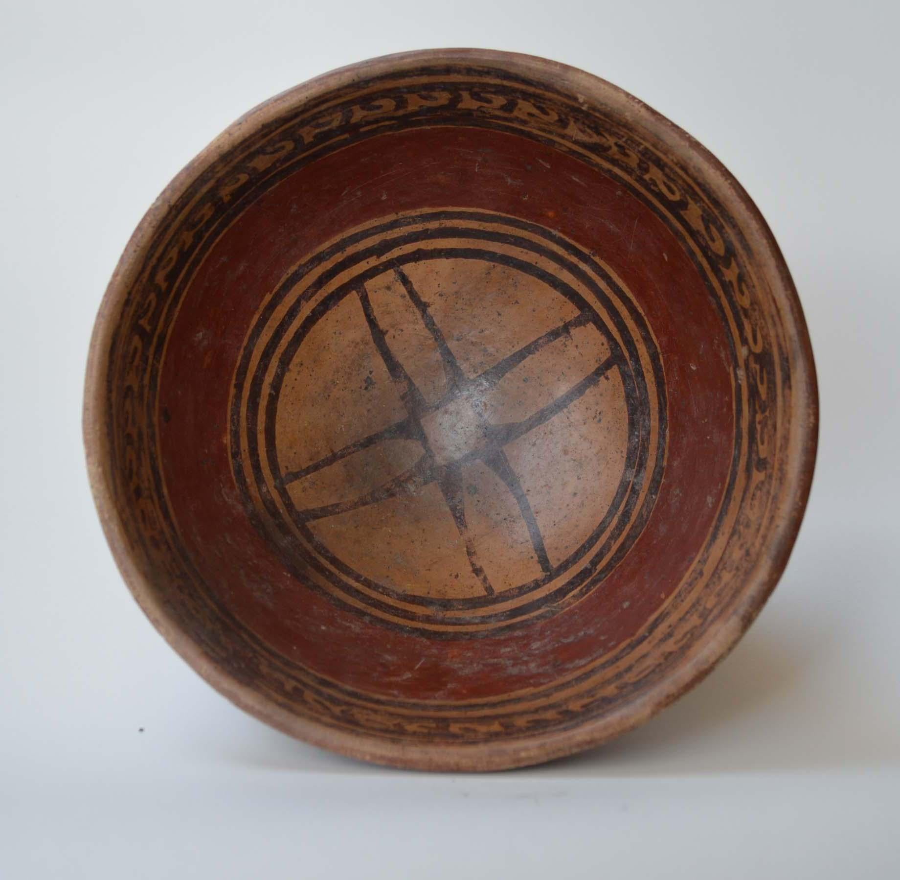 PRE COLUMBIAN ANCIENT SOUTH AMERICAN FINE NARINO CARCHI PAINTED BOWL CIRCA 1100-1400 COLOMBIA  ECUADOR
A FINE CARCHI/NARINO BOWL FROM THE BORDER REGIONS OF  ECUADOR COLOMBIA
THE INTERIOR PAINTED WITH LINNEAR  PATTERN 
MINOR RESTORATION ON UNDERSIDE