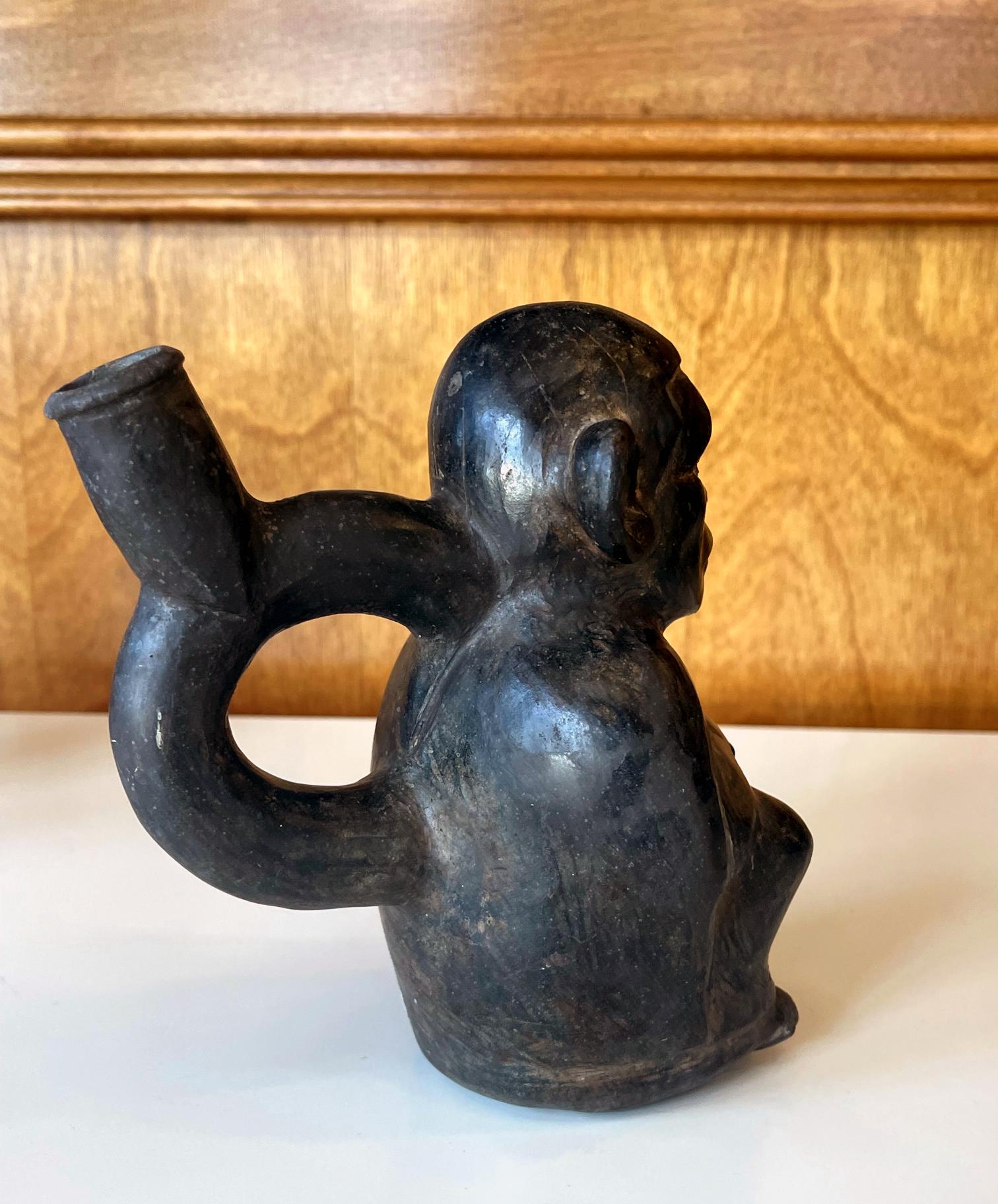 Peruvian Pre-Columbian Black Figural Stirrup Vessel Moche Culture For Sale