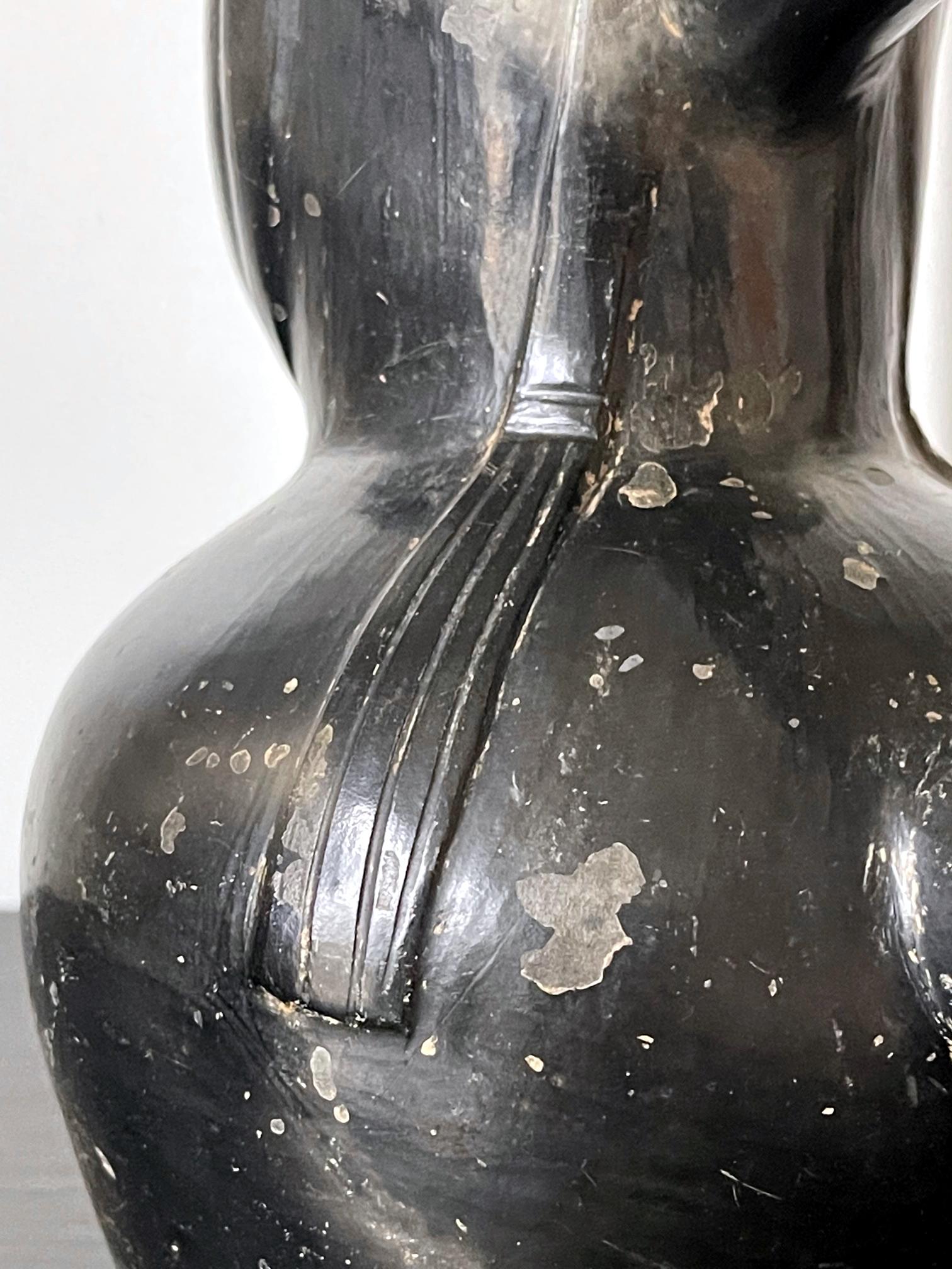 Pre-Columbian Black Portrait Stirrup Vessel from Moche Culture For Sale 8