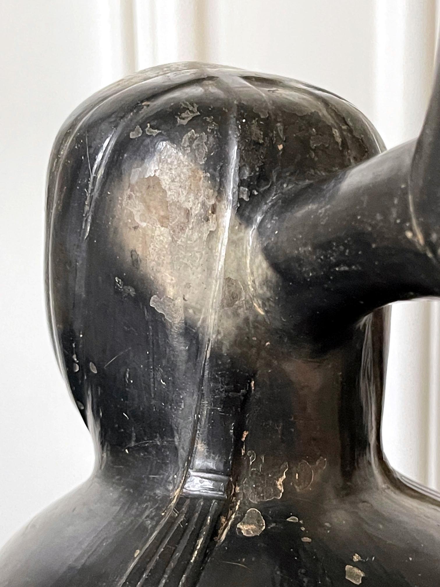 Pre-Columbian Black Portrait Stirrup Vessel from Moche Culture For Sale 9