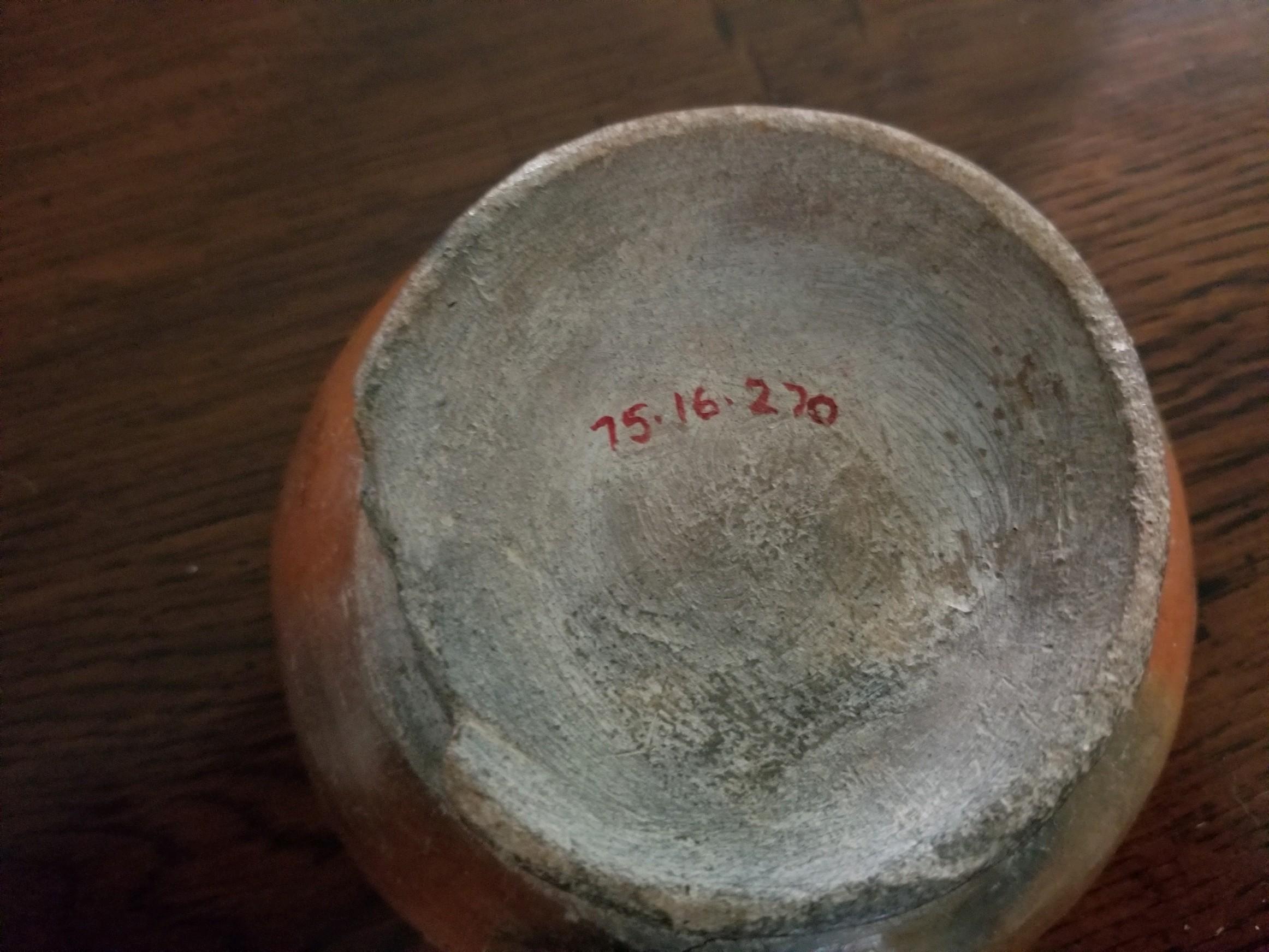 Precolumbian bowl with museum registry number fine example, 5.25 diameter x 2.5 inches, tall in good condition commensurateveith age, worn and chipped in base.