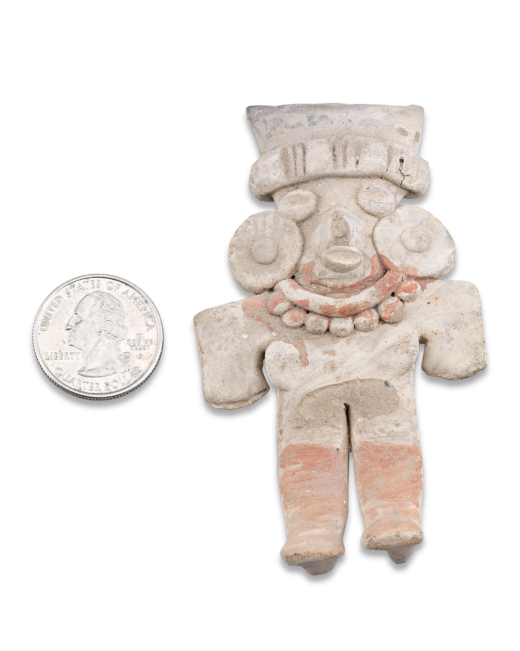 This lovely Chupicuaro lady wears an elaborate coiffure, large ear plugs, and a beaded jade necklace, all of which were highly prized by Chupicuaro nobility. The figure's coffee-bean shaped eyes and overall flatness are also characteristic of pieces
