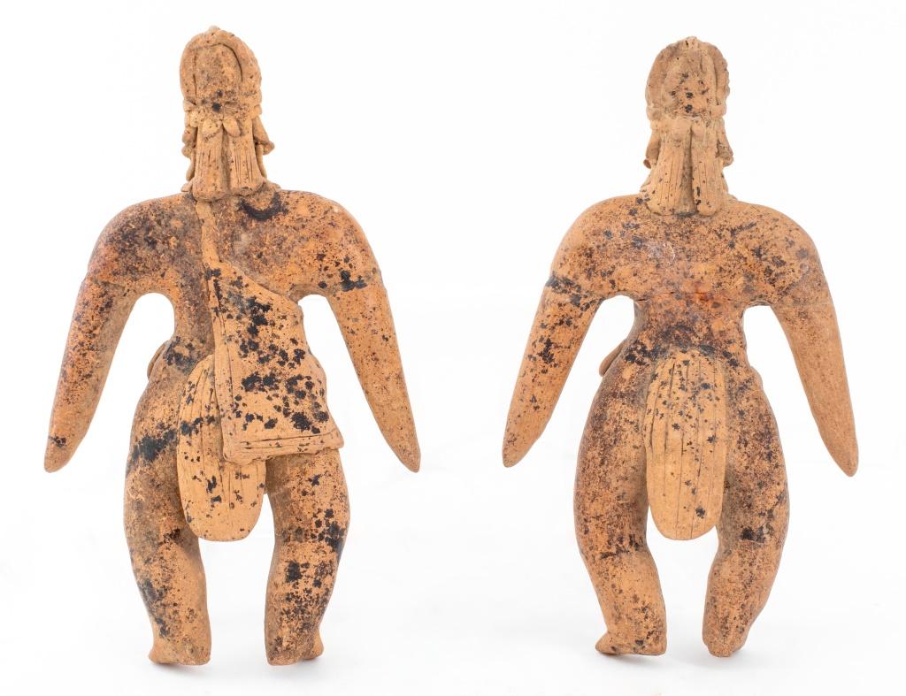 Two Pre-Columbian Colima Standing Warrior Sculptures, Mexico, 300-100 BCE, each with headdress, necklace, and waist wrap. Larger: 8.75