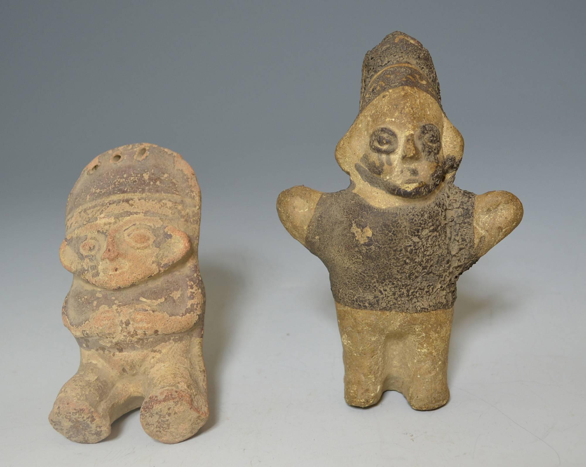 Pre-Columbian art
A Chancay figures pair of ancient South America.
A pair of small pottery Cuchimilco figures one standing maternity figure with child on back, the other seated
with cargo bundle on back.
Chancay culture, circa 1100-1400 AD,