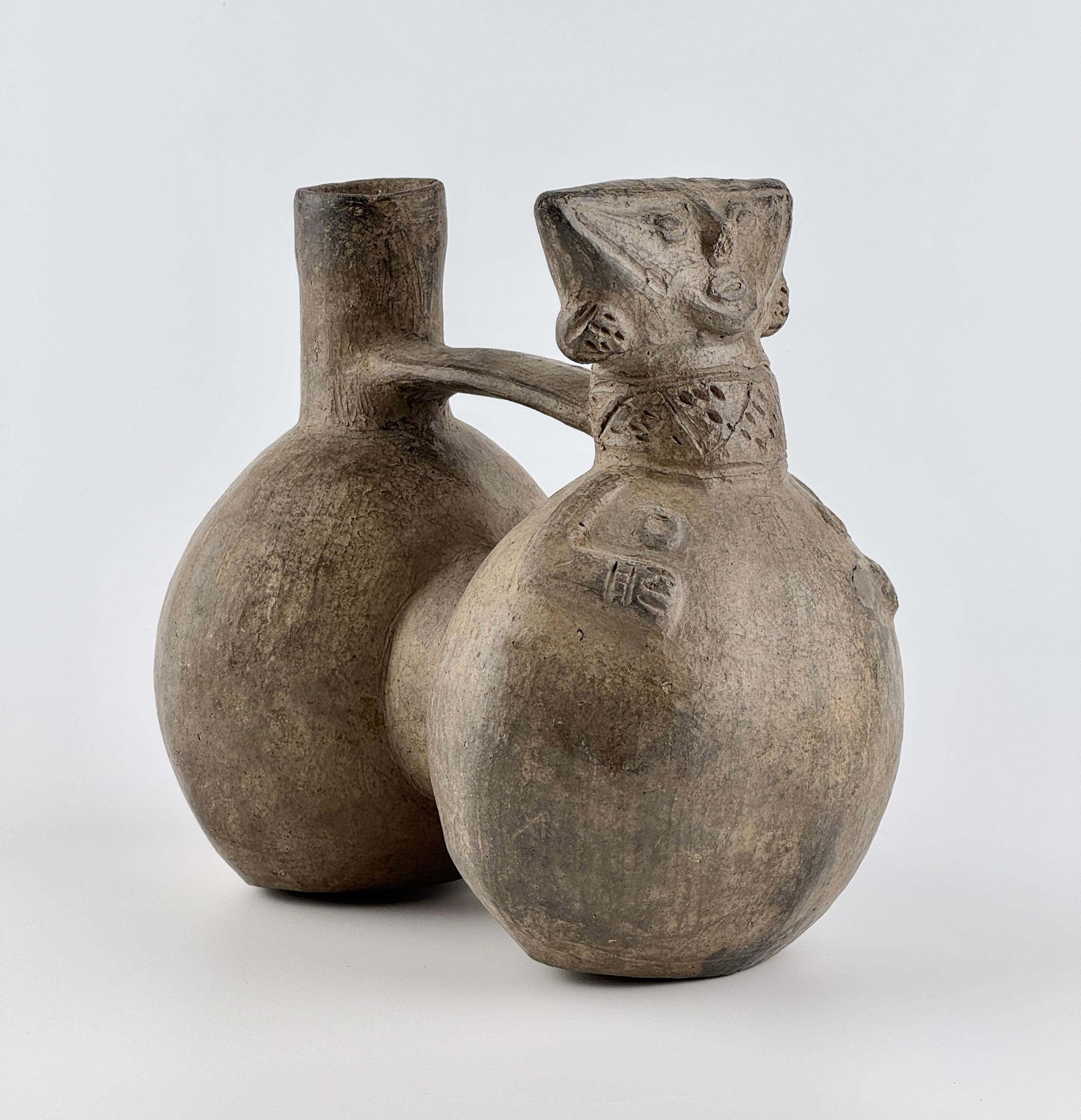 Peruvian Pre Columbian Double-Spouted Anthropomorphic Vessel For Sale
