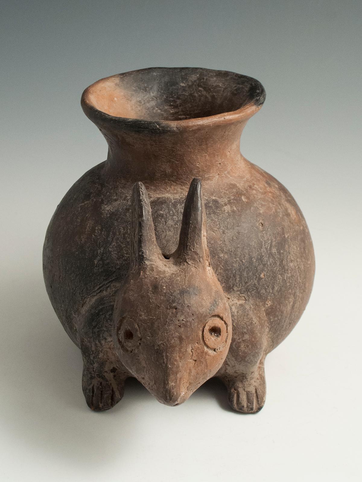 Earthenware Rabbit Vessel, Possibly Colima, West Mexico

There is a certain frightened charm about this unfurnished bunny, who is a bit rough-hewn, but intact.
Measures: 6