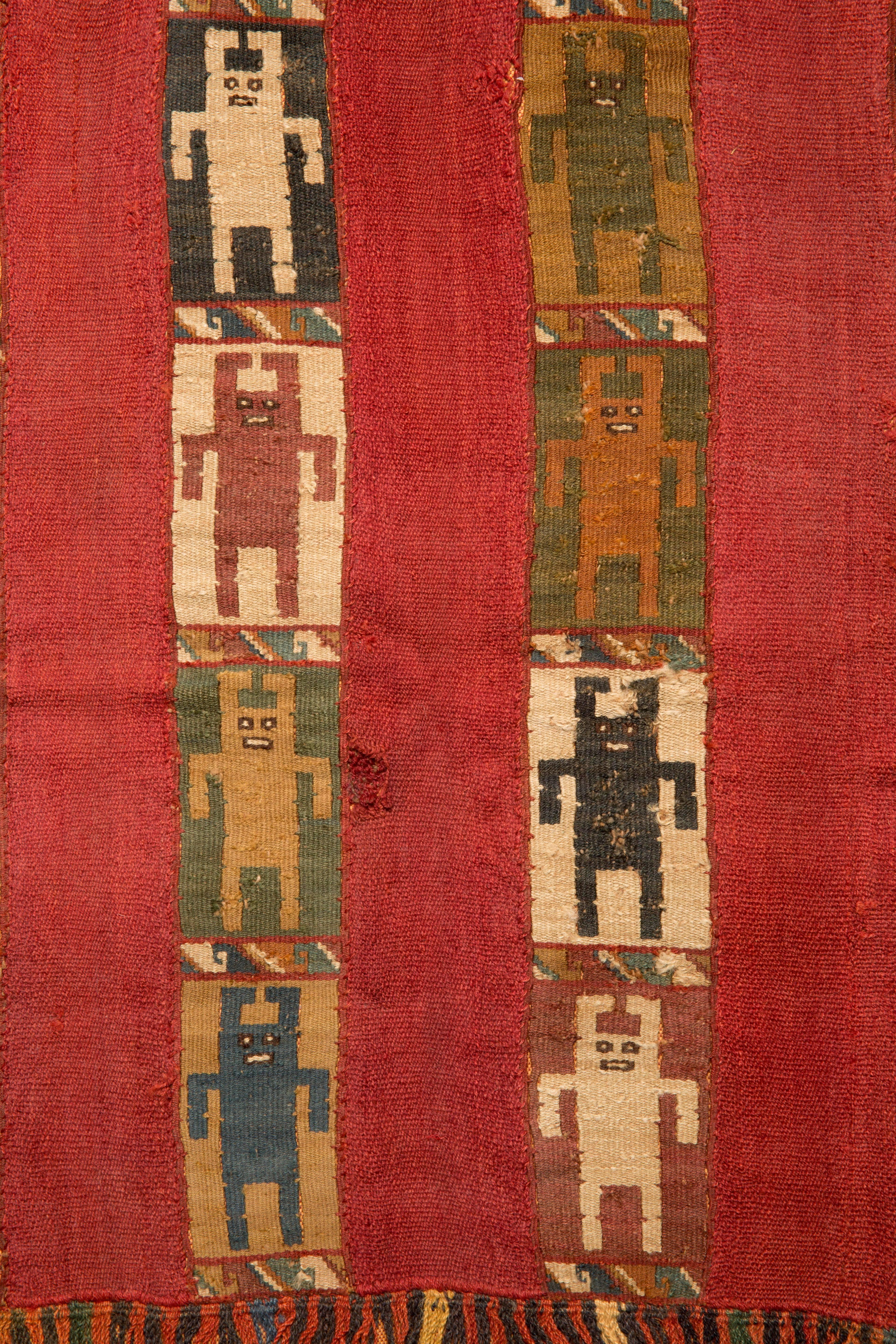 Inca Mantle with 16 figures in cubist form with multi-color fringes.
This pieces with a Certificat de Bien Culturel from France. 

For the Incas finely worked and highly decorative textiles came to symbolize both wealth and status, fine cloth