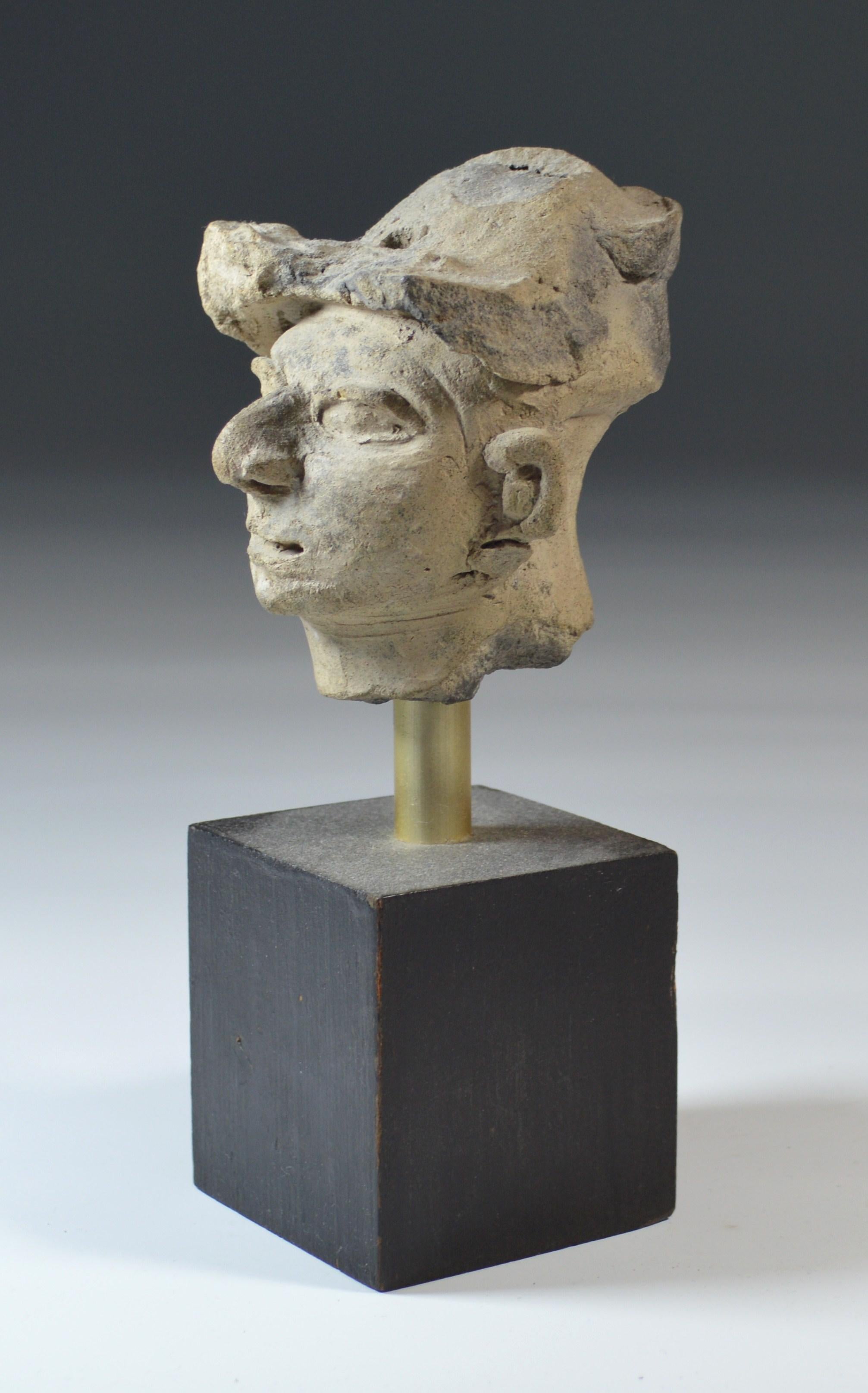 Pre Columbian La Tolita / Tumaco pottery head circa BC 200 Ecuador/ Columbia
A striking very finely modeled grey pottery head with a very expressive face with turban type headdress somewhat reminiscent of a European classical period sculpture.
Size