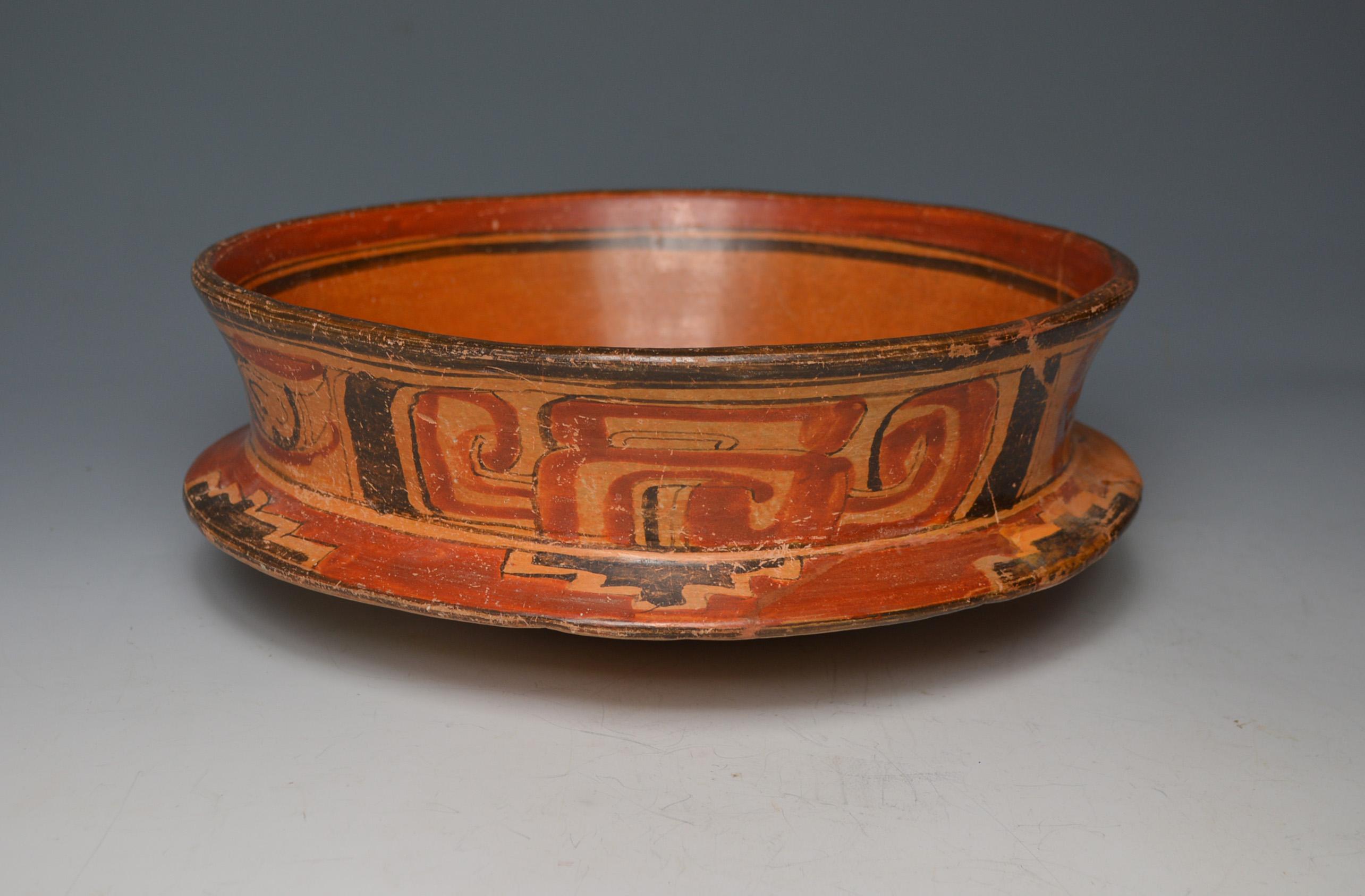 An impressive large Mayan Poly-chrome painted ceremonial pottery bowl
Guatemala/ central America late Classic period, circa A.D. 550-950,
A Beautiful large bowl of tapering circular form with bifurcated sides on a tapering slanted base,
painted