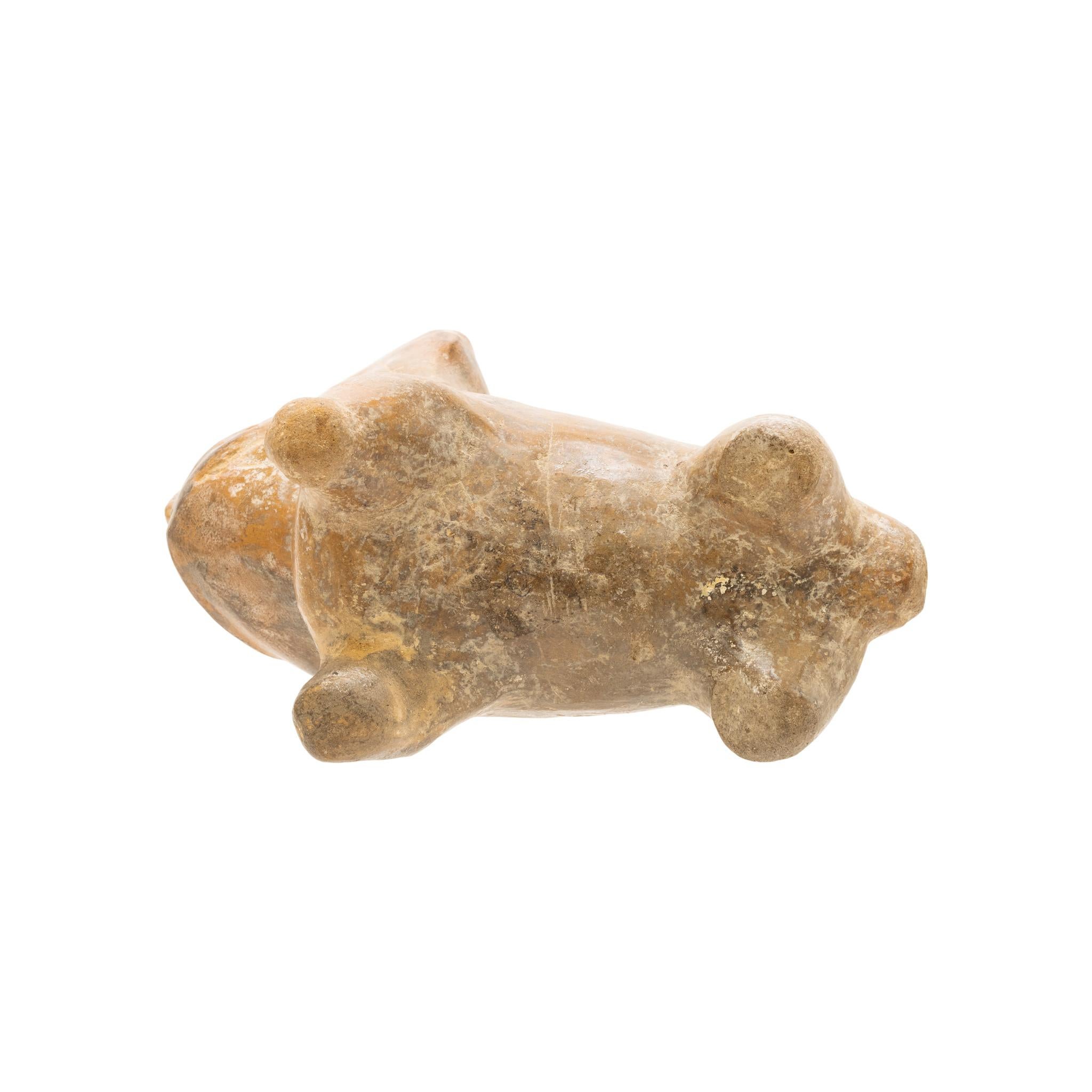 Manabi (Ecuador) Pottery dog figure with incising. 4 ½” x 2 ½” x 3 ½”.  100 BCE - 250 CE Ex. Hank Johnson Collection. Hank Johnson was a geologist, and passionate collector of historical and ancient artifacts. Starting with relics and bottles from