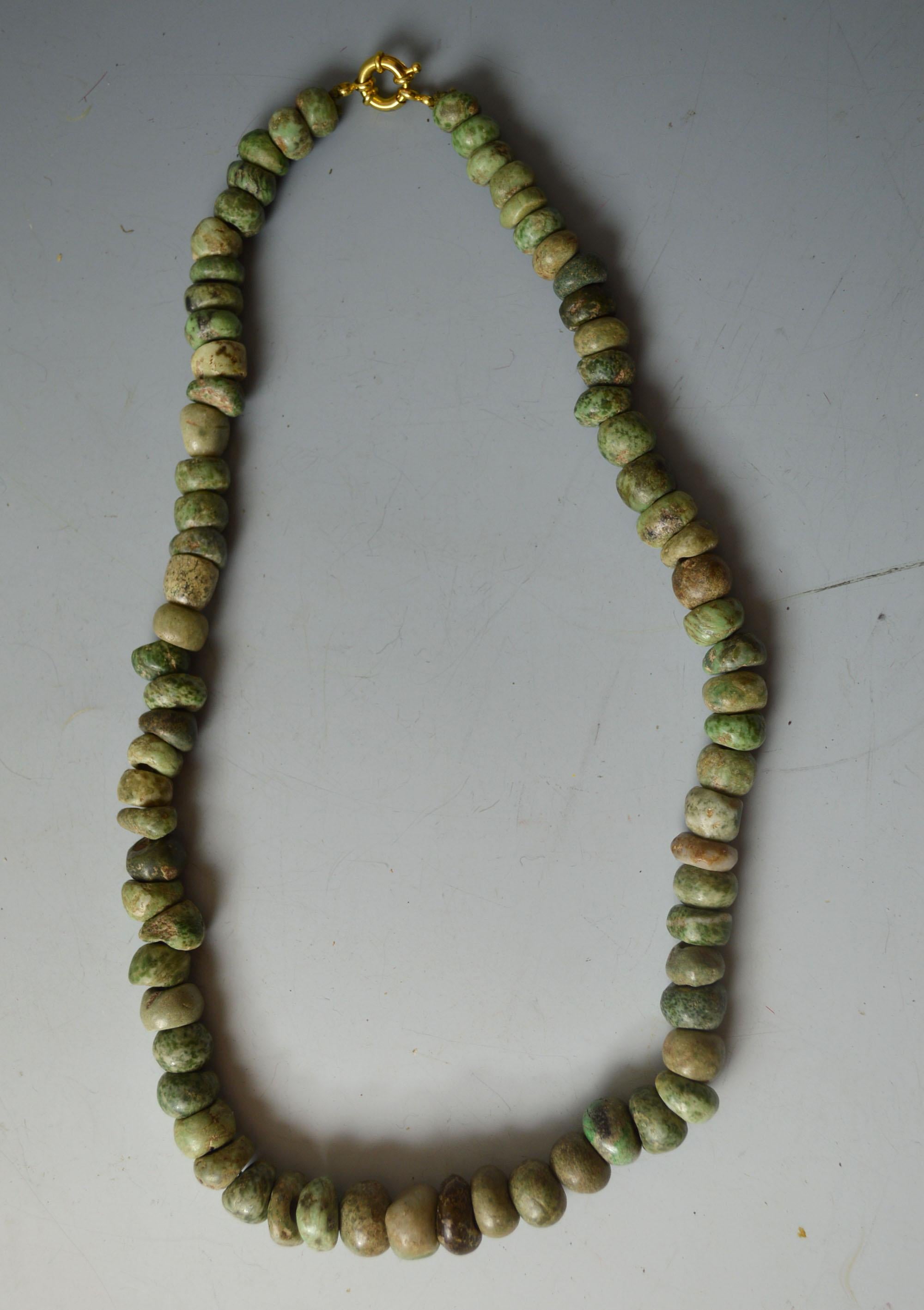 A Pre Columbian ancient Mexico Maya Jadeite necklace, circa 600–1200 AD

A fine Jadeite beaded necklace in light green jadeite 
Yucatan peninsula region Mexico
Overall length 23 inches 59 cm bead sizes 1 - 1.5 cm approx
Condition: good
Ex UK