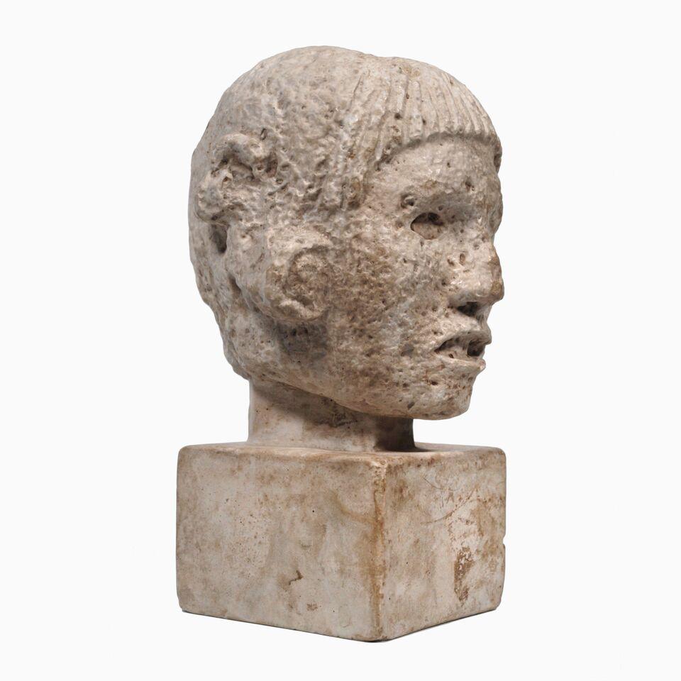 mayan head statue