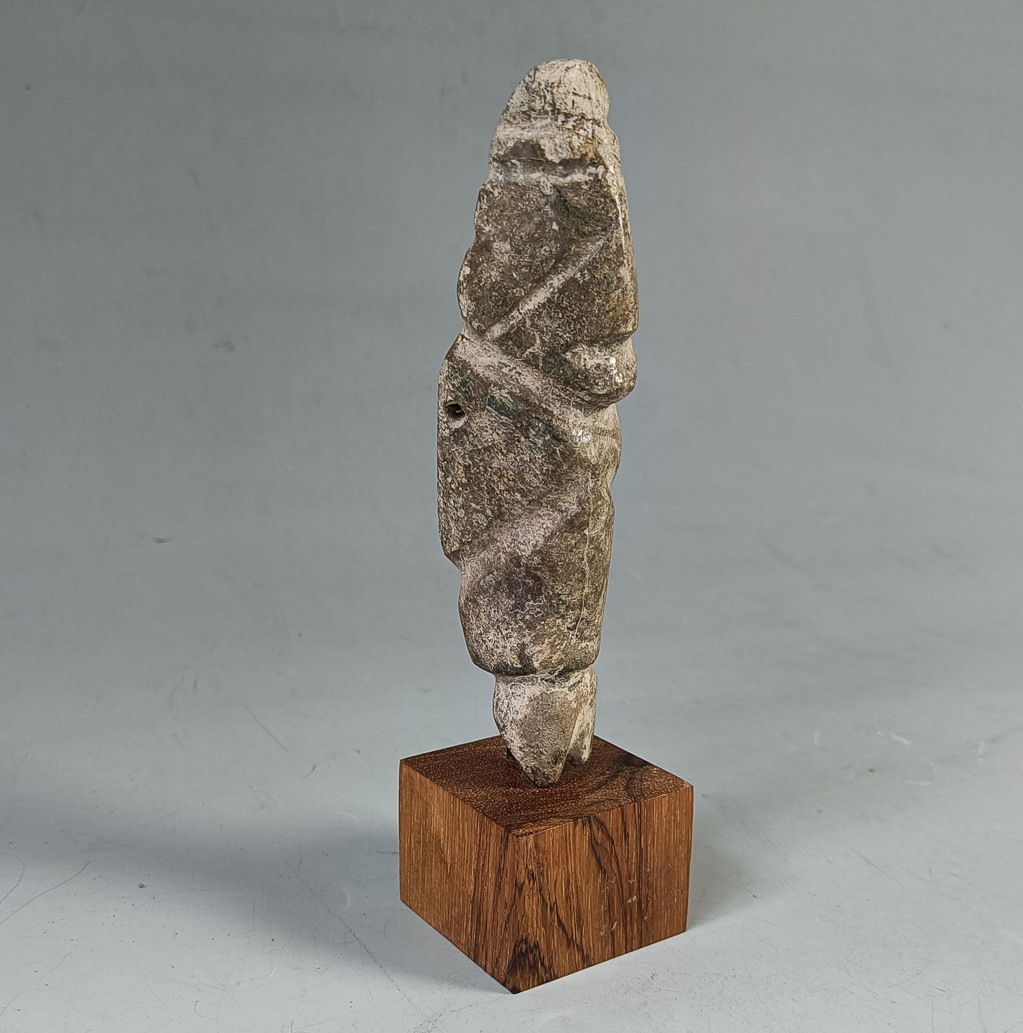  Pre Columbian Mezcala Stone Pendant Axe god Figure Ancient Mexico

Pre-Columbian, Southern Mexico, Guerrero region, Mezcala culture, ca. 600 to 100 BCE

A  abstract serpentine figural pendant form known as an axe god with string-cut grooves and
