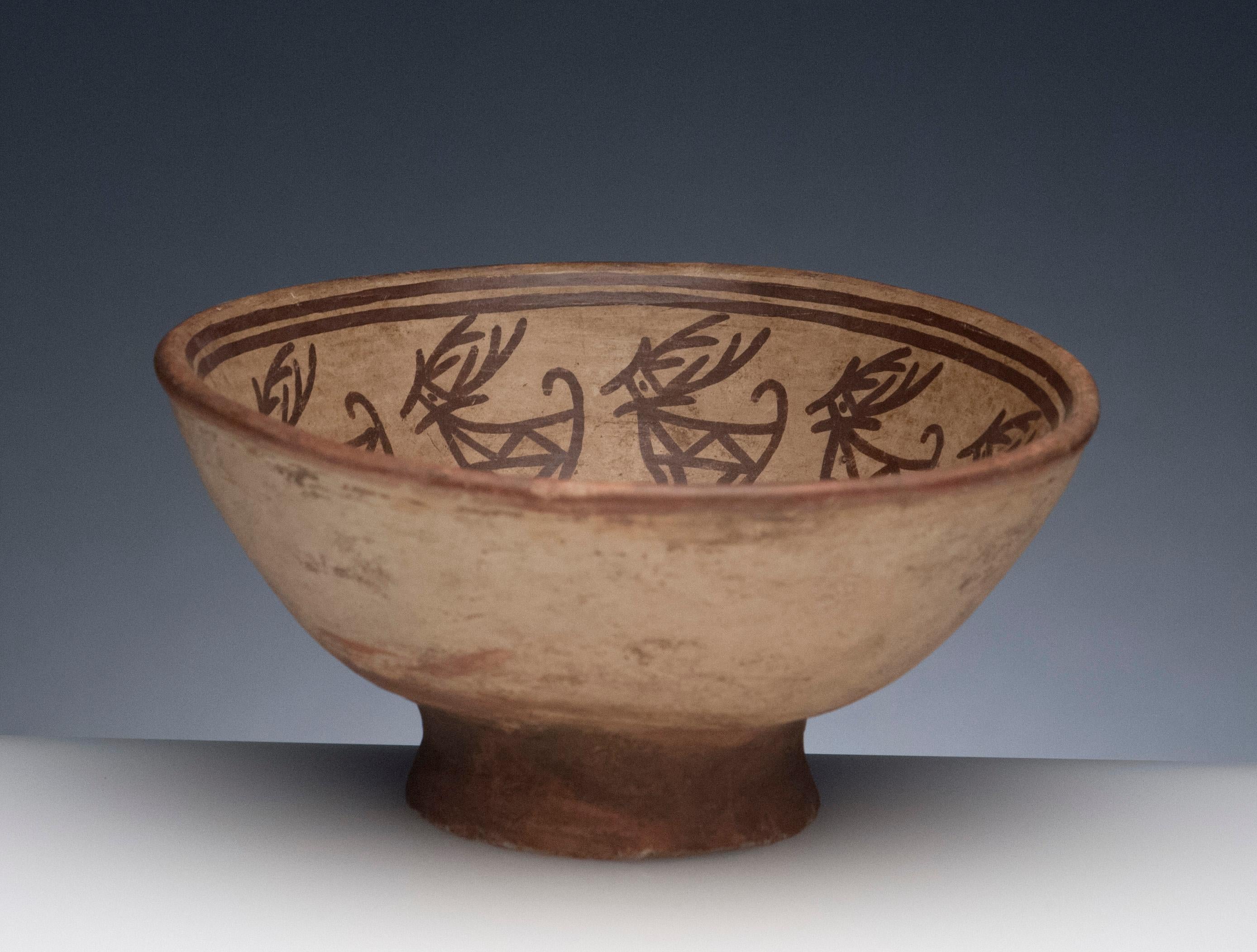 Fine Pre-Columbian Narino footed bowl, circa 850 to 1500. Bowl depicts deer image with alternating eight pointed star symbol, most likely Venus.