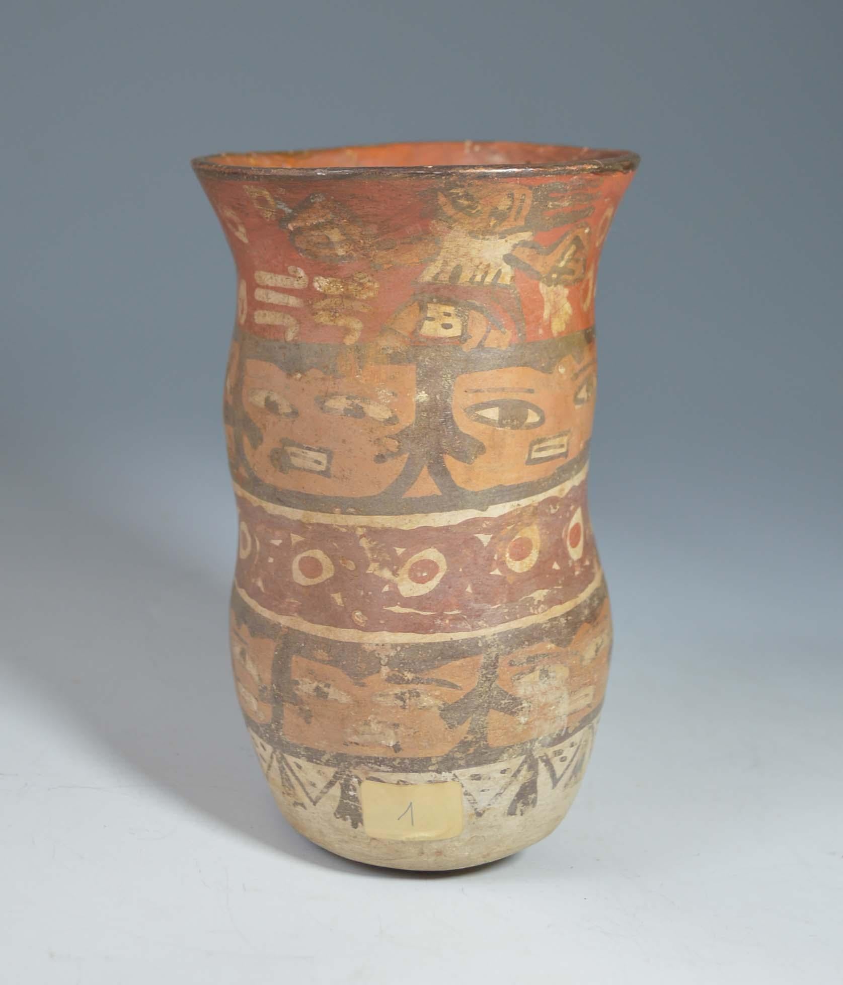 Pre Columbian
A Nazca cylinder vase circa 100 BC-800 AD
The pottery vase painted with dancing figures
and bands of trophy heads.
Ex French collection before 1960
Measure: Height 18 cm
condition: Minor rim cracks rejoined other wise fine.

Ex