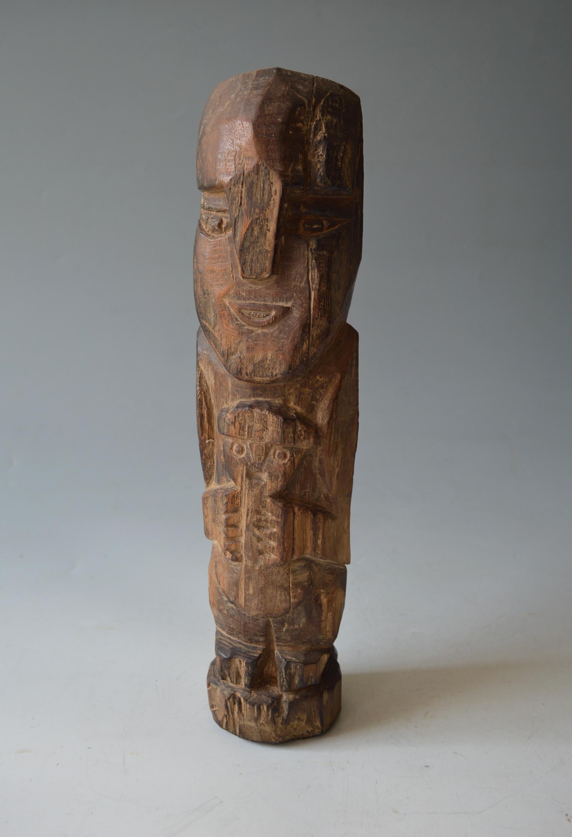 Pre columbian Lamabayeque wood figure Peru Circa 750 to 1375 AD
A rare standing figure of a deity with triangular tear drop shaped eyes holding a child,
Carved in very dense heavy hard wood 
Measures: Height 14 inches, 36 cm weight, 1.5 kg approx
Ex