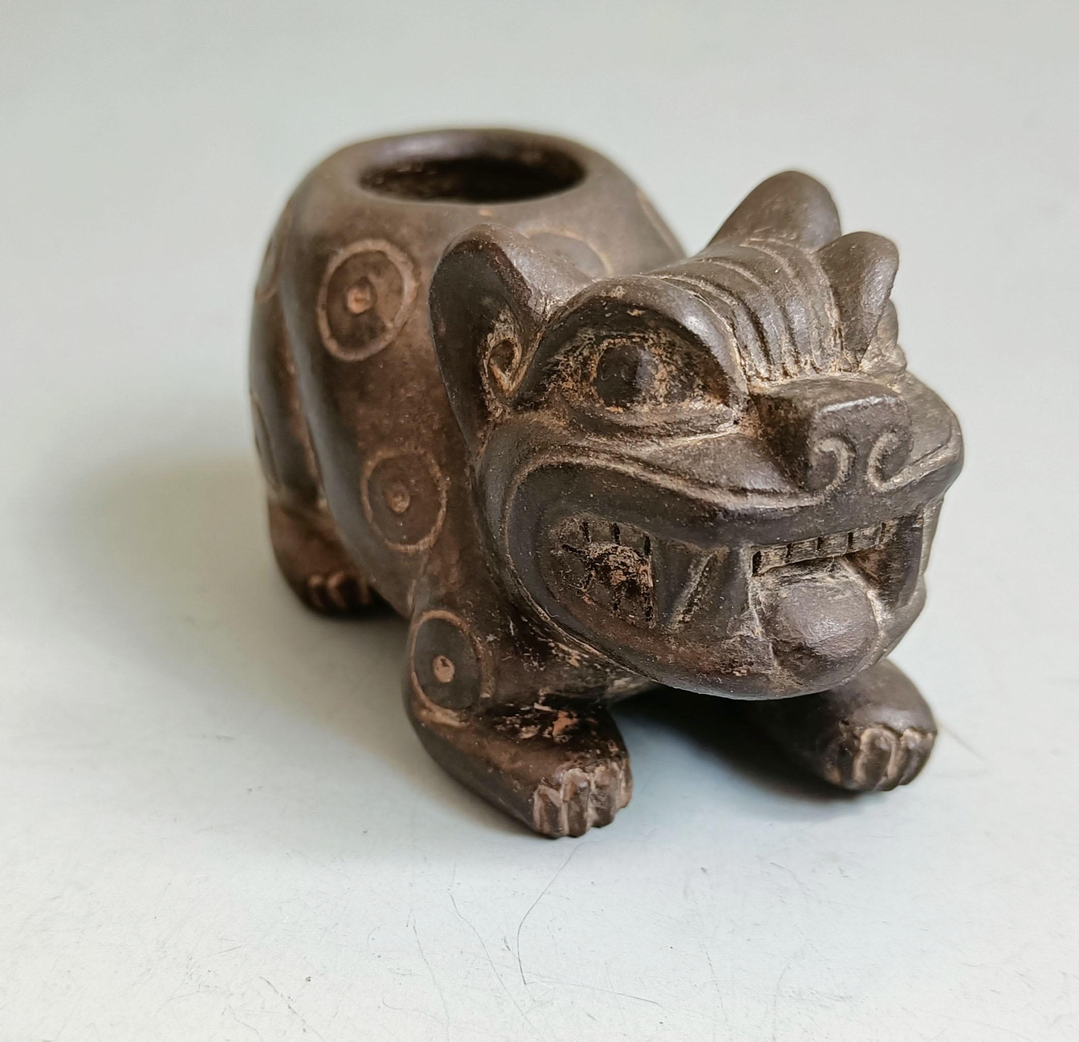 Pre-Columbian Chavín Feline Lime Vessel – Ancient South American Pottery, 900 to 200 BCE

A remarkable Pre-Columbian Chavín lime vessel from ancient South America, expertly modelled in grey clay. This small lime  vessel,  9 cm length and 6 cm in