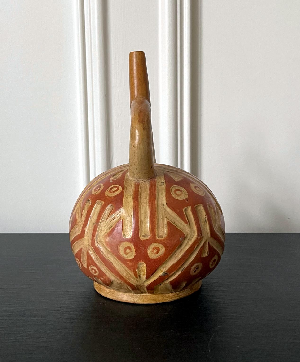 Peruvian Pre-Columbian Stirrup Vessel from Moche Culture For Sale