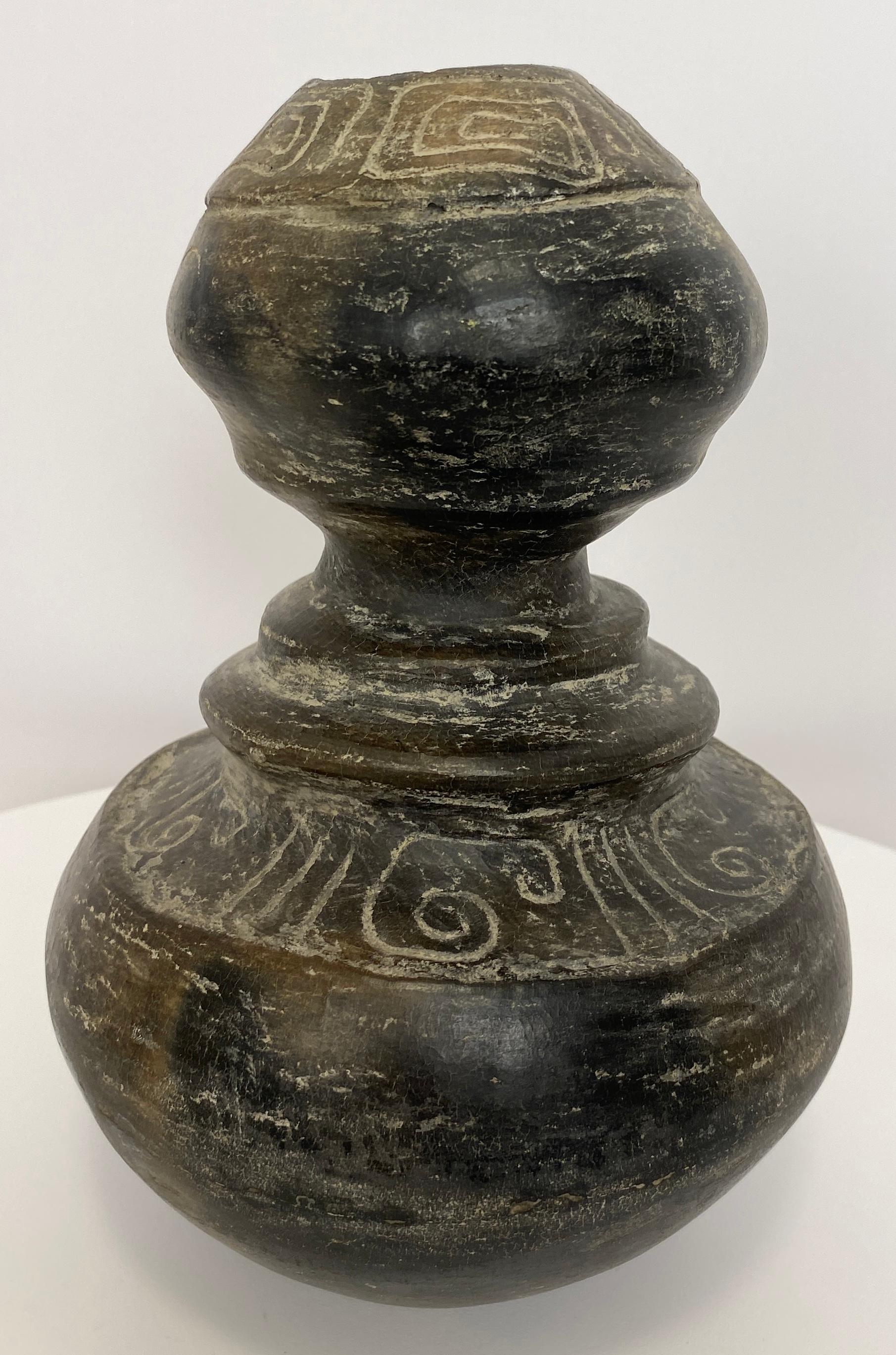 This fantastic and well-proportioned Pre-Columbian style Mexican primitive style vessel figure 

The sculpture measures 
9