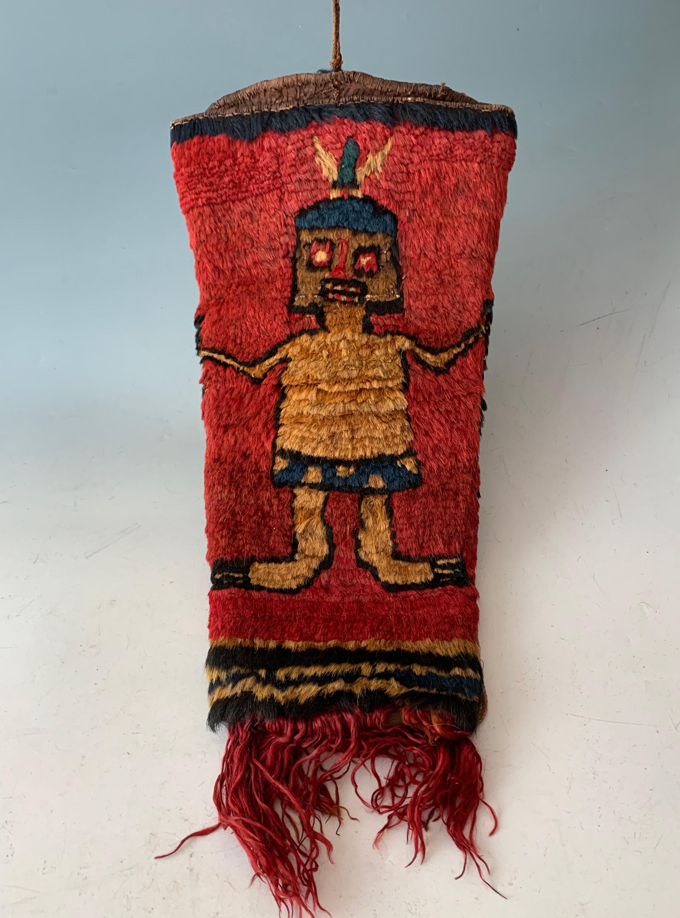 Pre Columbian superb Rare large Coca Bag Nazca   
Stunning Museum quality large coca leaf bag with central standing figure, made in multi layered camelid ( llama) wool 
This stunning and exceptionally rare piece would have been made for a