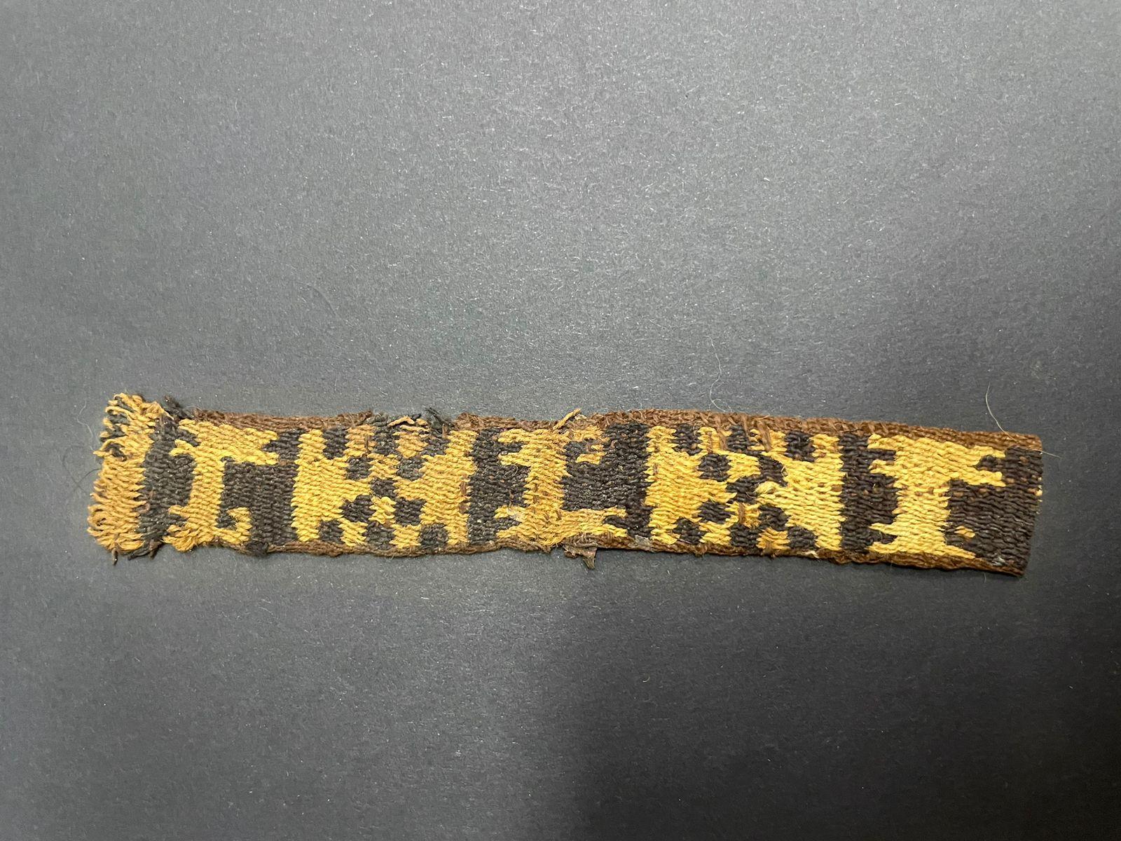  Pre-Columbian  Inka Textile Fragment - Peru, Ex Ferdinand Anton decorated with checkerboard and llama designs. 
It is a wonder to behold antiquities such as a Pre-Columbian Textiles, an authentic piece of art that has been preserved for centuries