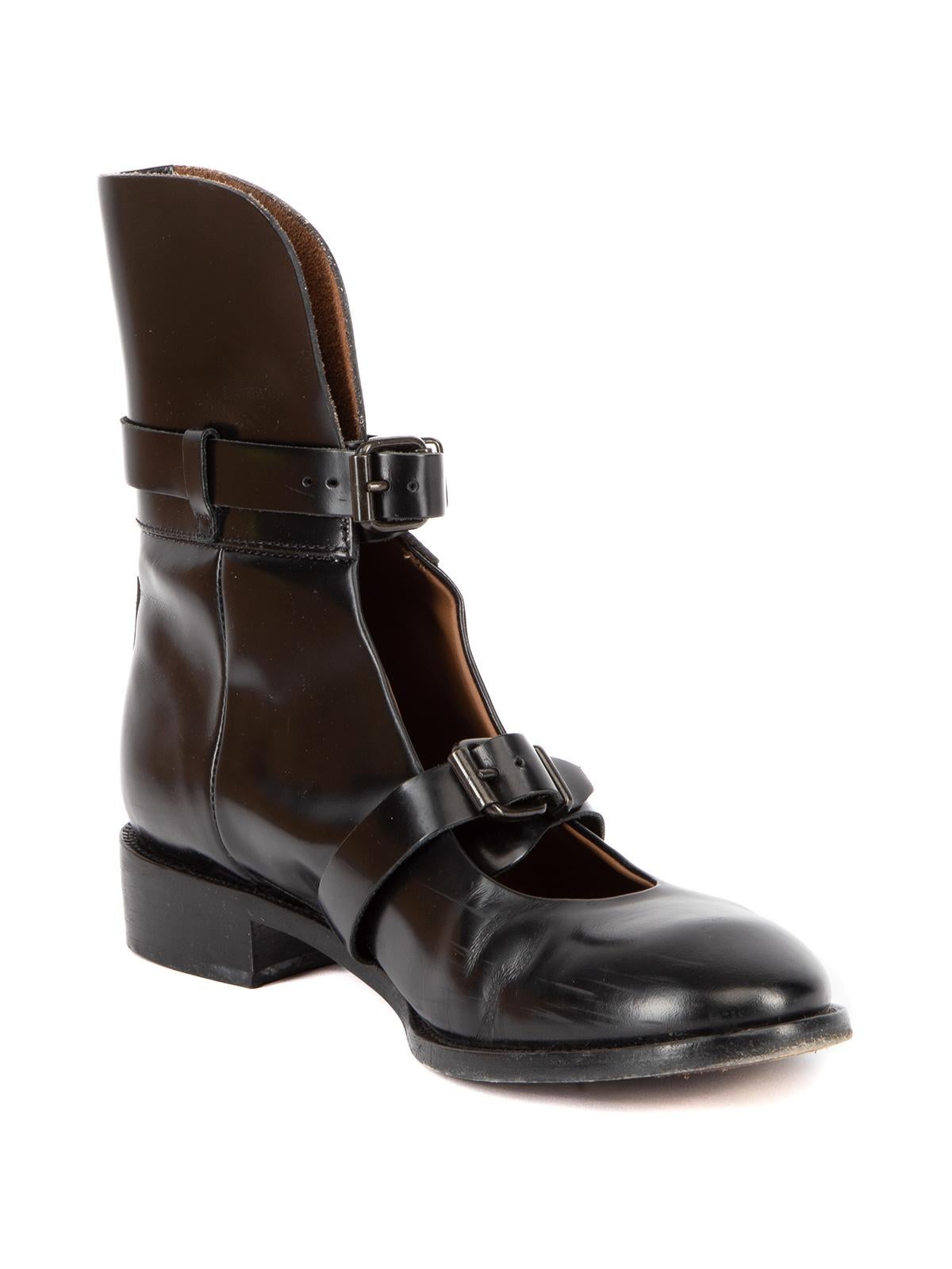 CONDITION is Good. General wear to boots is evident. Moderate signs of wear to leather exterior, outsole and scuffs seen on this used Acne Studios designer resale item. Details Black Patent leather Cut out Almond toe Buckle fastening details Flat