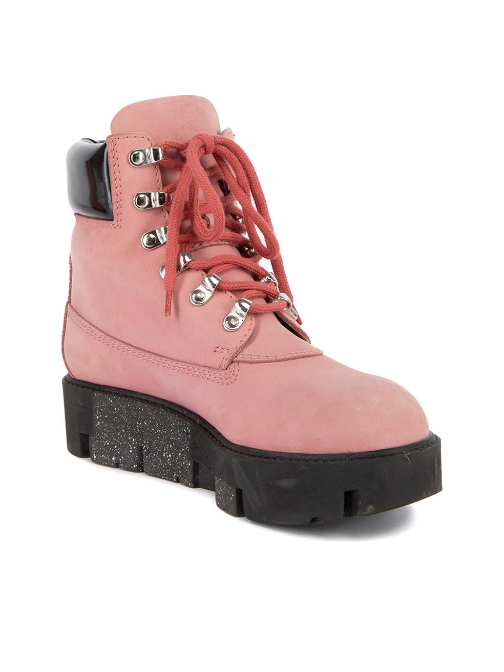 CONDITION is Very good. Minimal wear to boots is evident. Minimal wear to the exterior suede nubuck material where scuffs/marks and light creasing can be seen on this used Acne Studios designer resale item. Details Pink Suede Combat boots High top