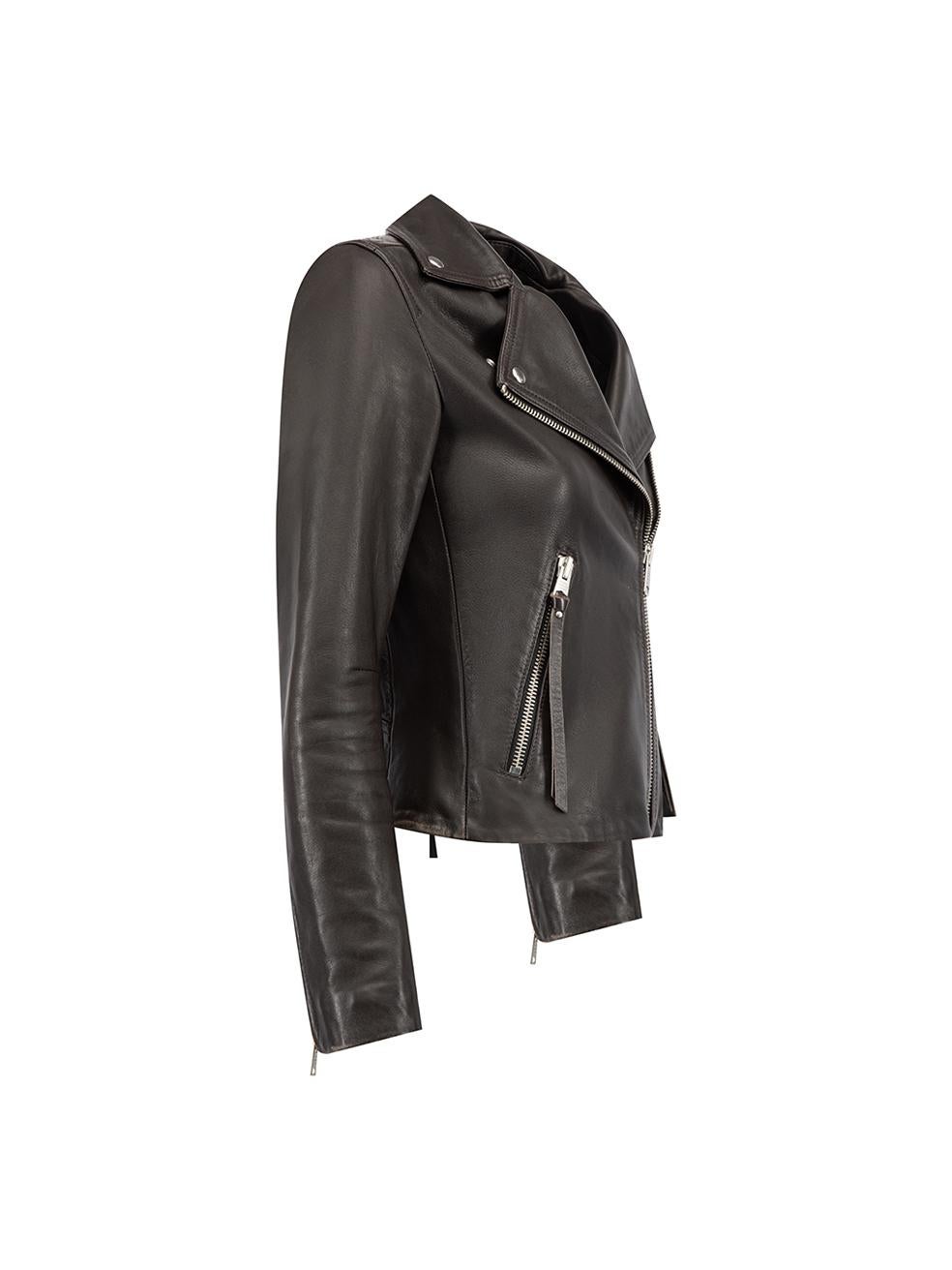 CONDITION is Good. Minor wear to jacket is evident. Light wear to leather exterior where visible scuffing can be seen at the hemline and cuffs on this used AllSaints designer resale item. Details Dark Brown Leather Cropped biker jacket Zipped cuffs