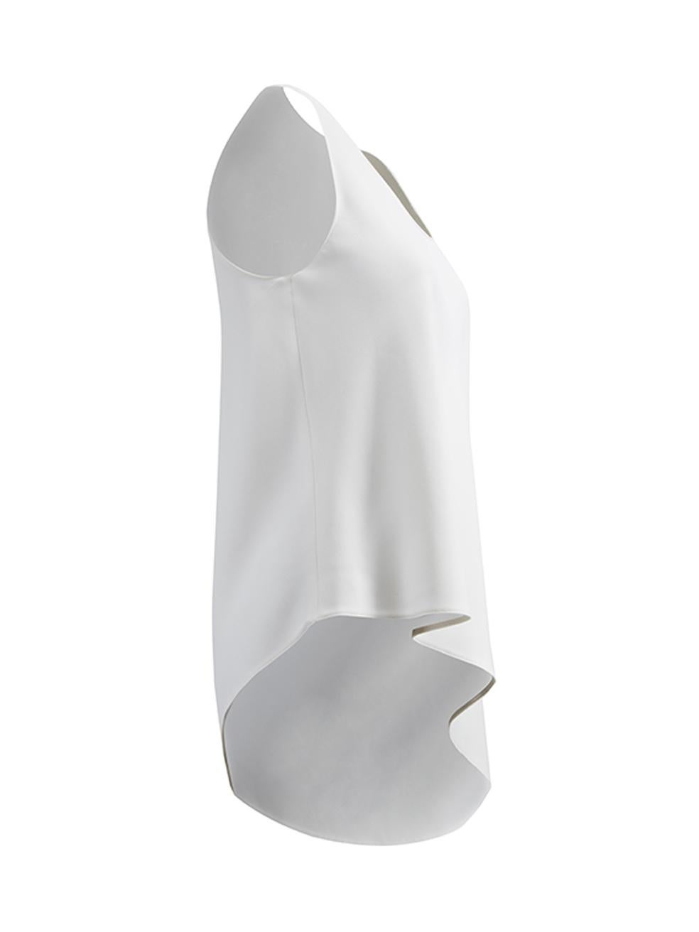 CONDITION is Very good. Hardly any visible wear to top is evident. There is a small mark at the bottom of the draped material on this used Balenciaga designer resale item. Details 2014 White Polyester Tank top Round neckline Asymmetric droopy tail