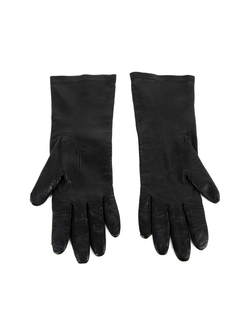 CONDITION is Very good. Minimal wear to gloves is evident. Minimal wear to exterior leather on this used Balenciaga designer resale item. Details Black Leather Gloves Logo printed on right hand Silk lining Made in France Composition 100% Leather