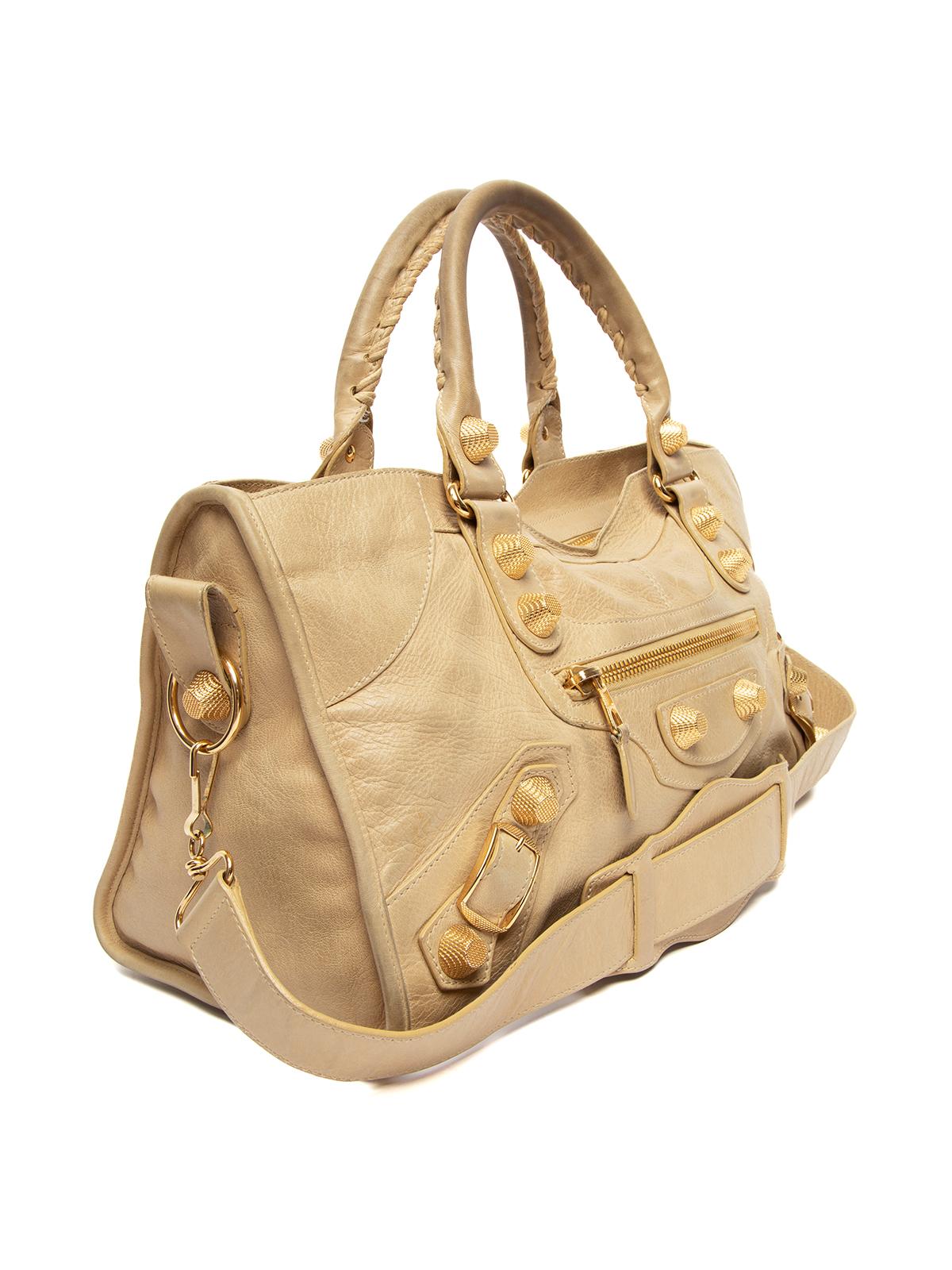 CONDITION is Good. Minor wear to city bag is evident. General signs of creasing to leather, moderate discolouration to leather handles and metal hardware on this used Balenciaga designer resale item. Details Beige Leather City Bag Zip fastening Two