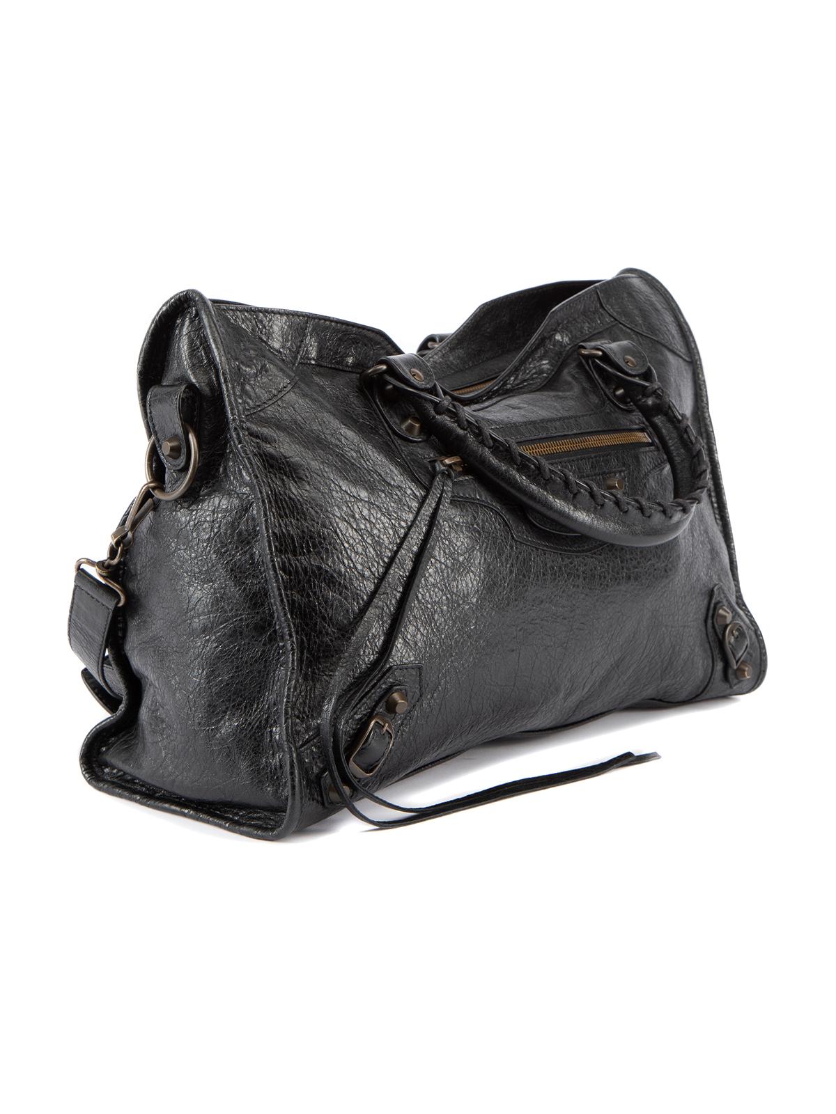 CONDITION is Very good. Minimal wear to bag is evident. Minimal wear to the hardware on this used Balenciaga designer resale item. Details Black Leather 2x Top handles 1x Detachable shoulder strap One main compartment with double zip closure 1x