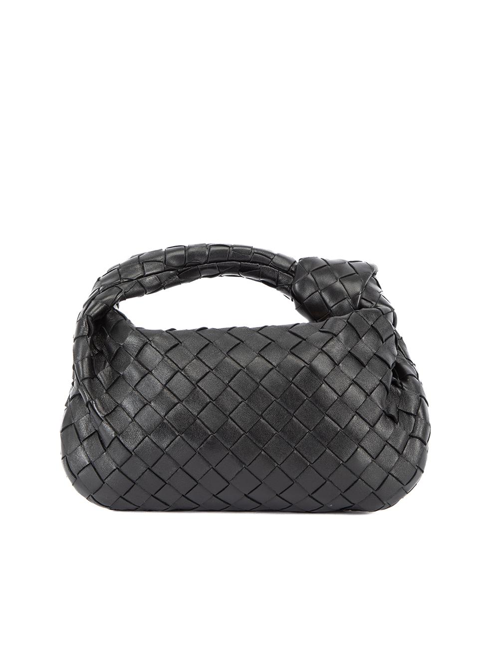 CONDITION is Very good. Minimal wear to bag is evident. Minimal wear to the leather interior at the bottom of the bag from use on this used Bottega Veneta designer resale item. Details Black Leather Mini top handle bag Intrecciato design 1x Top