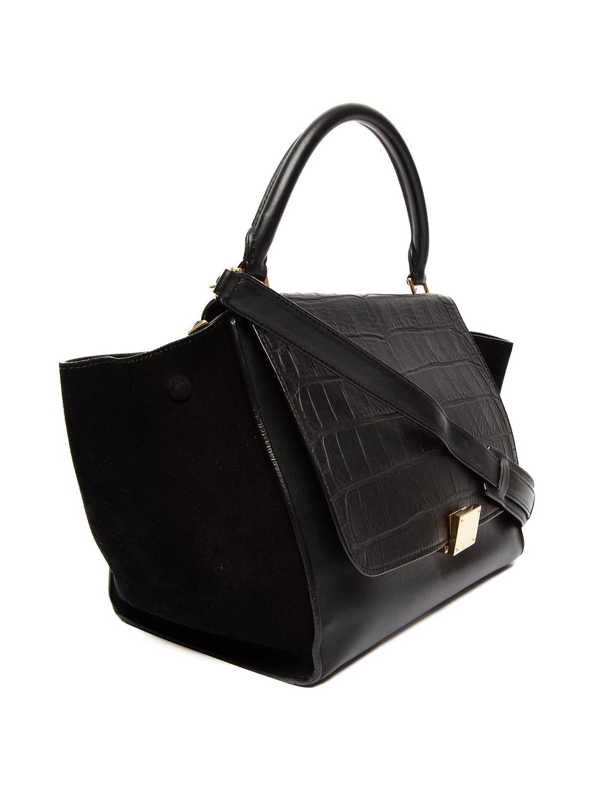 CONDITION is Very good. Very minor wear to bag is evident. Minimal wear to suede outer on this used Celine designer resale item. Details Trapeze Bag Colour - black Material - leather and suede Removable shoulder strap Zip fastening with push lock