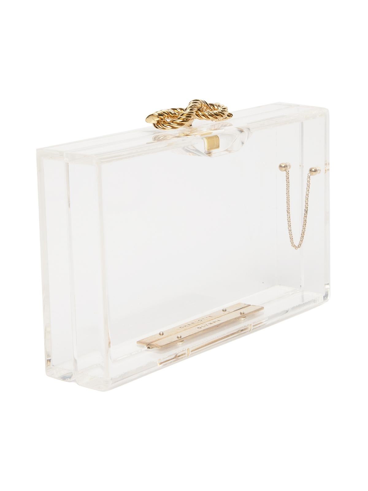 CONDITION is Good. Some wear to clutch is evident. Slightly visible scratches to interior & exterior, and discolouration to gold metal hardware on this used Charlotte Olympia designer resale item. Details Clear Perspex Clutch Gold metal hardware