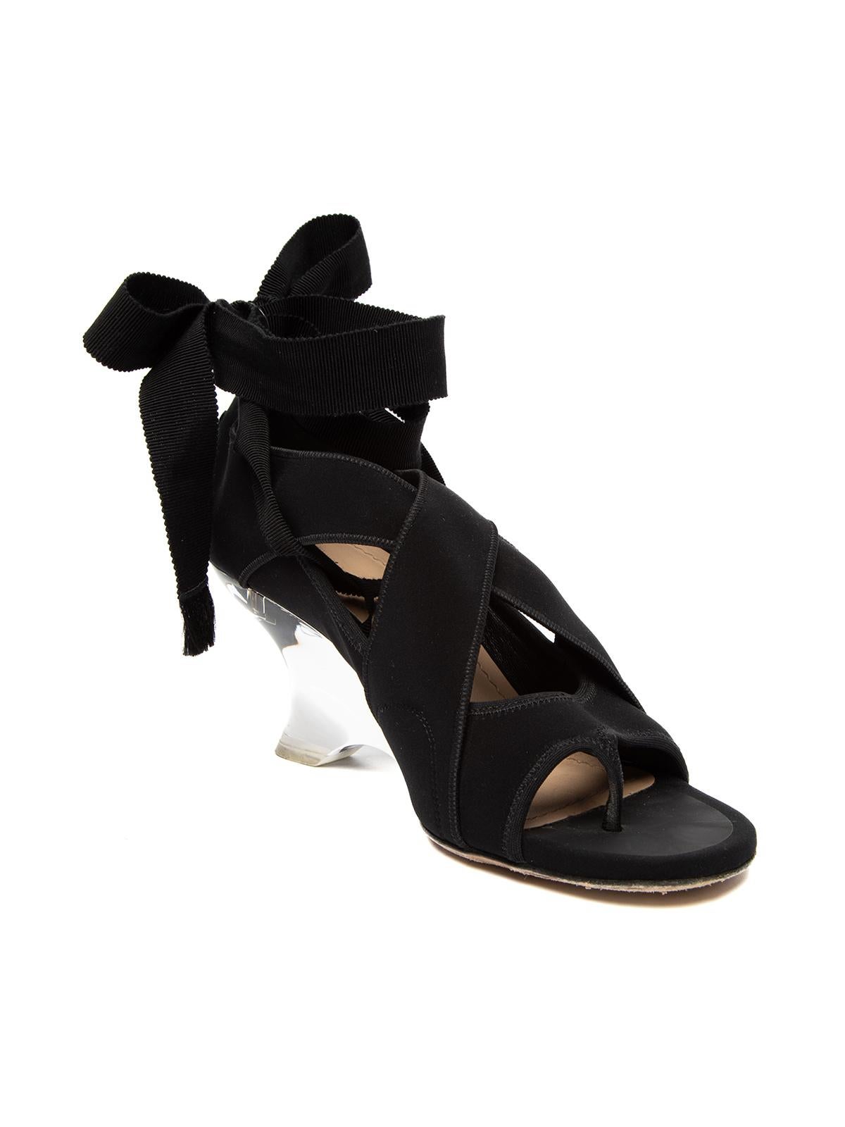 CONDITION is Very good. Very minor wear to shoes is evident. Moderate wear to outsoles on this used Christian Dior designer resale item. Details Colour - black Material - (feels like: spandex/nylon) Style - wedge Toe style - peep-toe Straps/