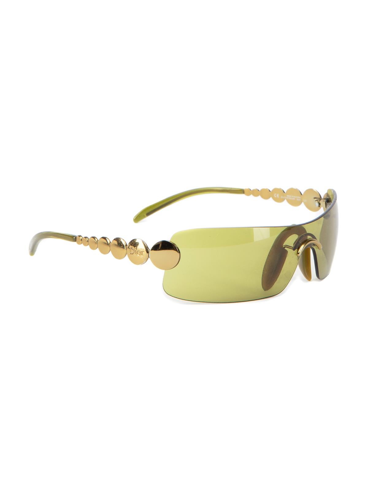 CONDITION is Very good. Minimal wear to sunglasses is evident. Minimal wear to the lens and arms where light scuffs can be seen on this used Christian Dior designer resale item. Details Green Gold tone circular design on arms One piece lens Gold