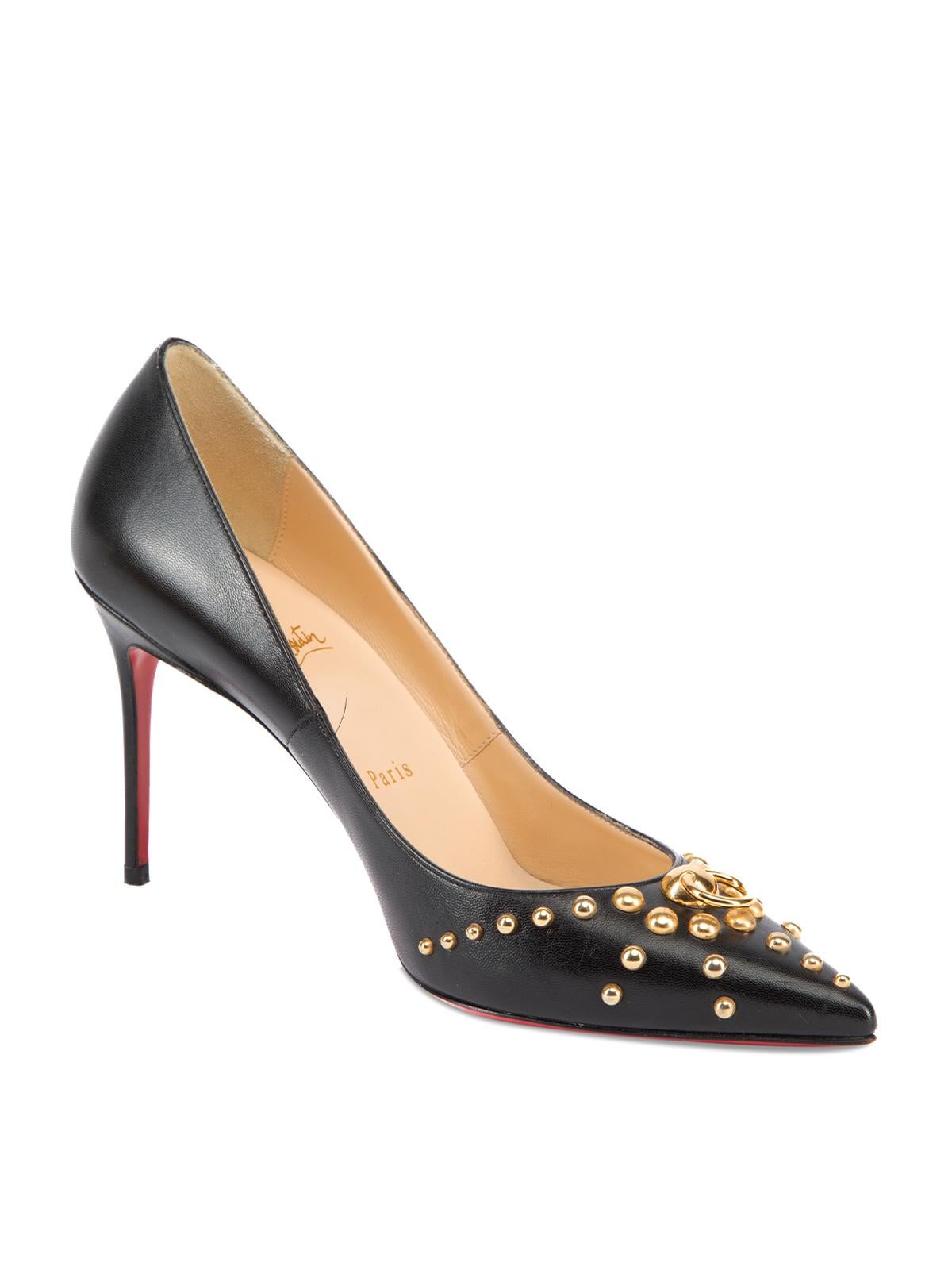 CONDITION is Very good. Minimal wear to shoes is evident on this used Christian Louboutin designer resale item. This item comes with box. Details Black Leather Slip on pumps Pointed toe Stiletto high heel Gold tone door knock and studs on toe cap