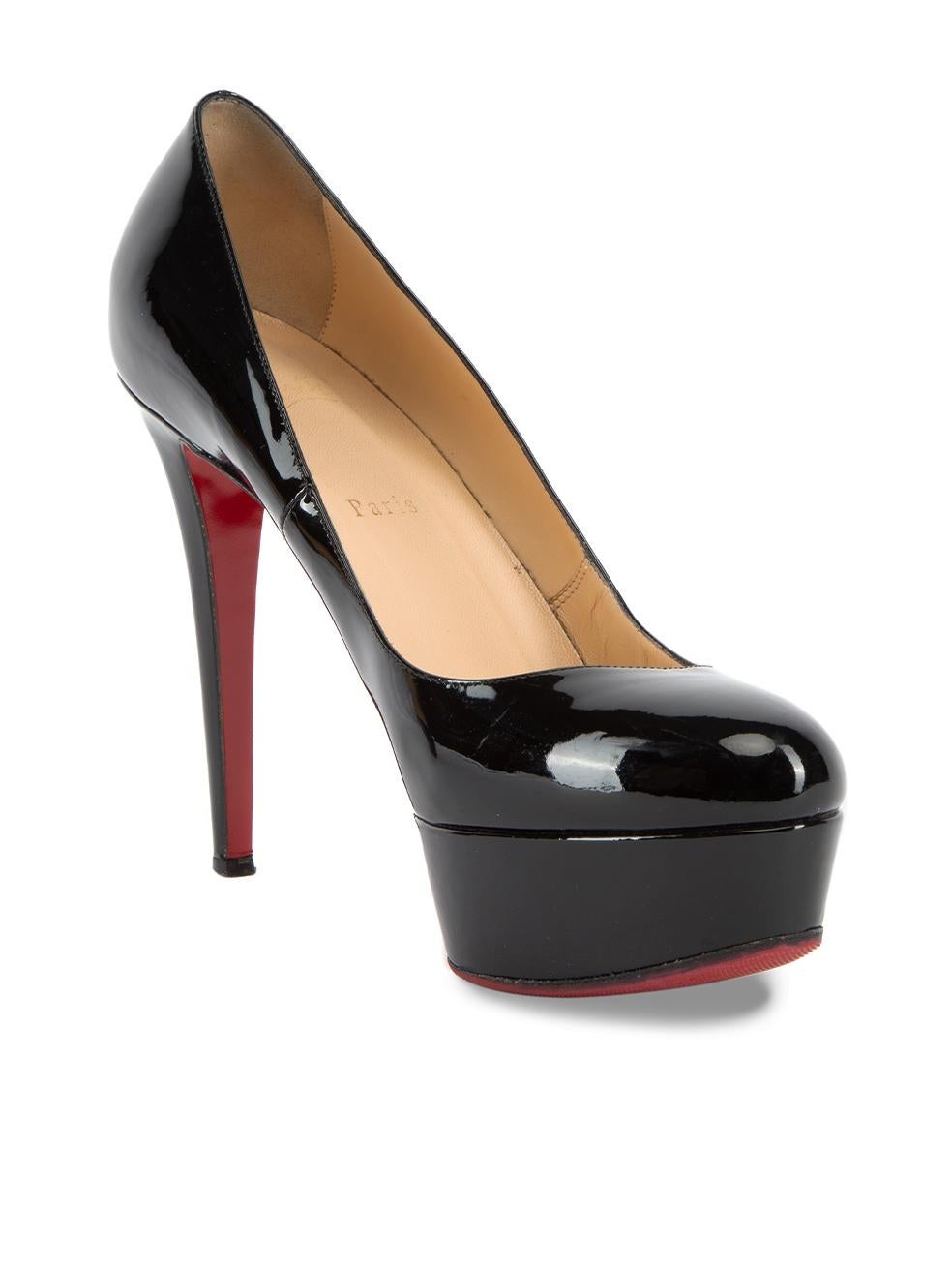CONDITION is Very good. Minimal wear to heels is evident. Minimal wear to the patent exterior and the heel tip is a little worn down. The patent material at the bottom of the right heel stem is scuffed on this used Christian Louboutin designer