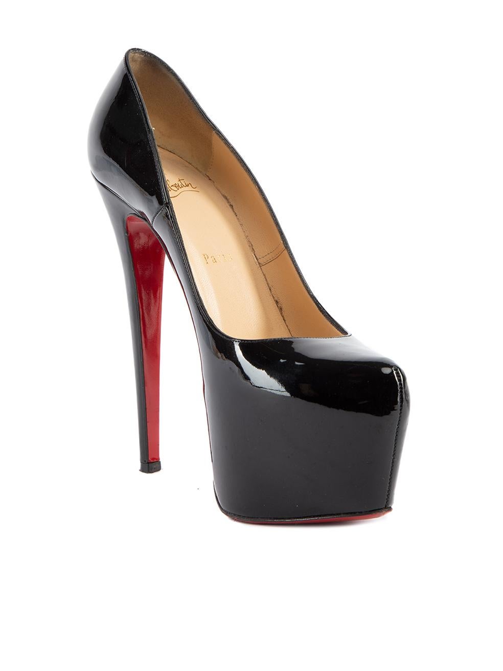 CONDITION is Very good. Minimal wear to shoes is evident. Marks are seen on the heel of both shoes on this used Christian Louboutin designer resale item. Details Black Patent leather Pointed toe Platform high heel Slip on Signature Christian