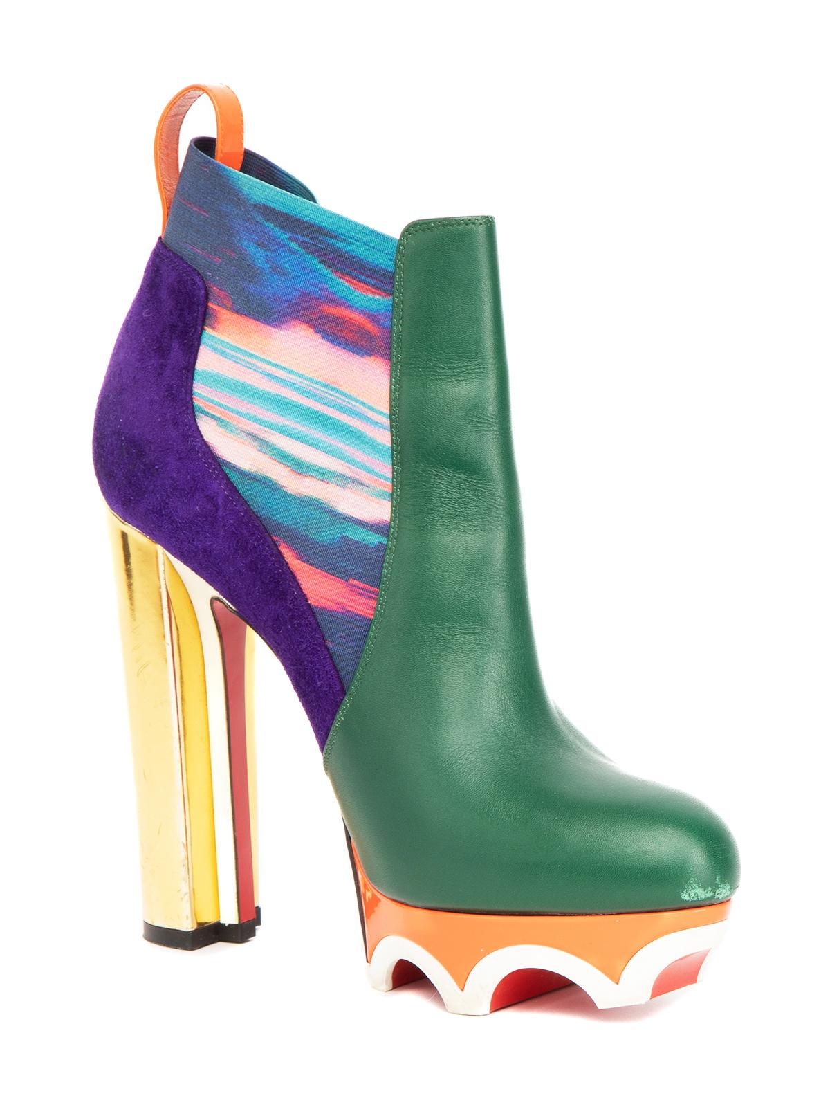 CONDITION is Good. Minor wear to ankle boots is evident. Light wear/scuffs to heels stems and leather on this used Christian Louboutin designer resale item. Details Loubi-Athlete Collection Multicolour Leather, suede, elastic Platfom High Heel Round