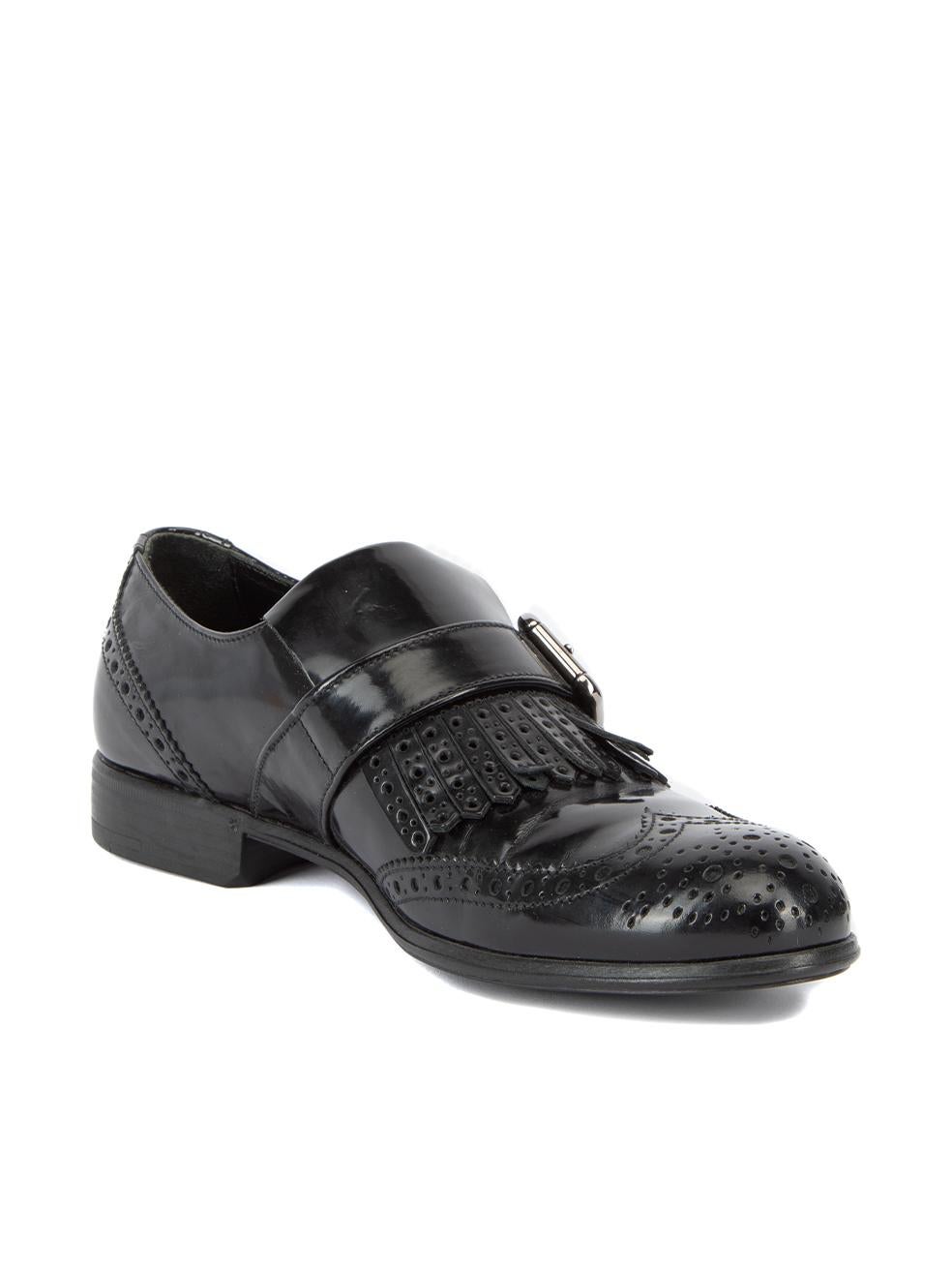 CONDITION is Very good. Hardly any visible wear is evident on this used Dolce & Gabbana designer resale item. Details Black Patent leather Round toe Brogue design Buckle closure Low heel Made in Italy Composition Exterior: Patent leather Interior: